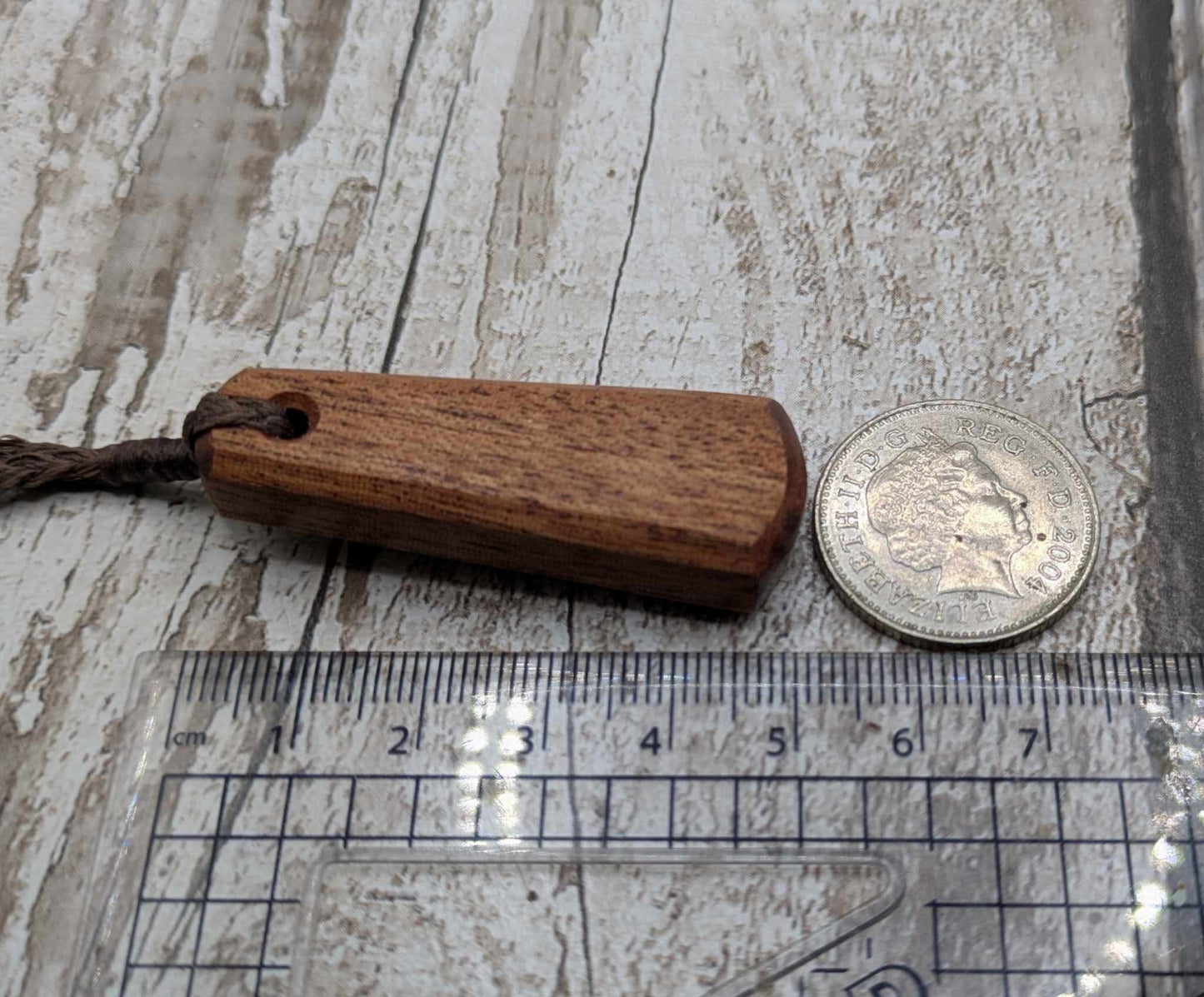 Sepele mahogany wood roimata drop pendant.