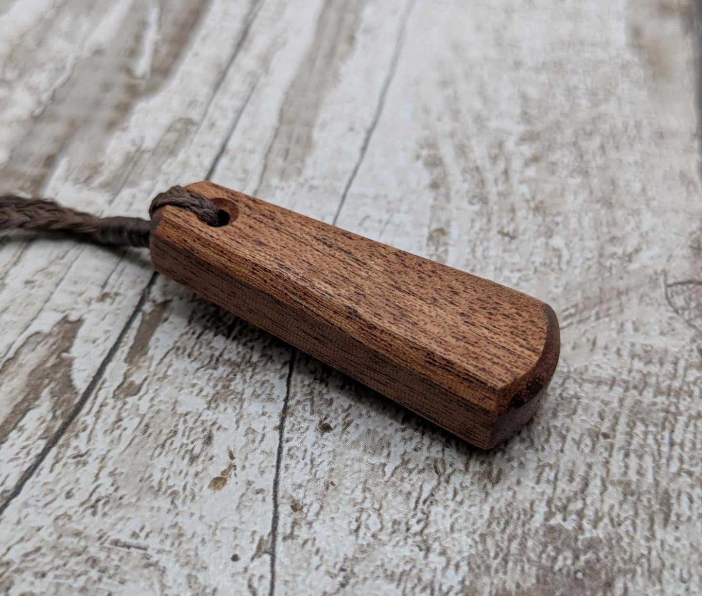 Sepele mahogany wood roimata drop pendant.