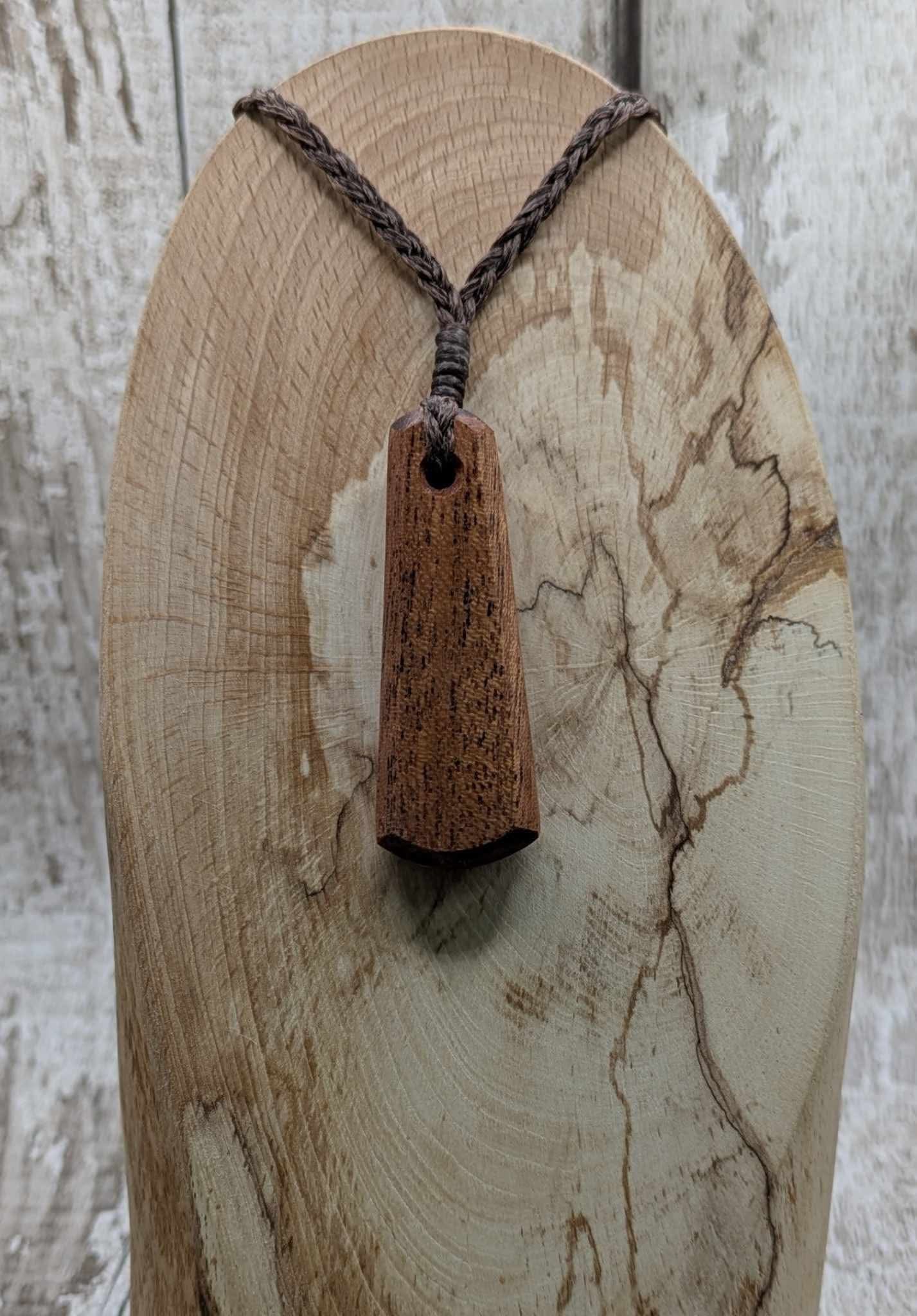 Sepele mahogany wood roimata drop pendant.