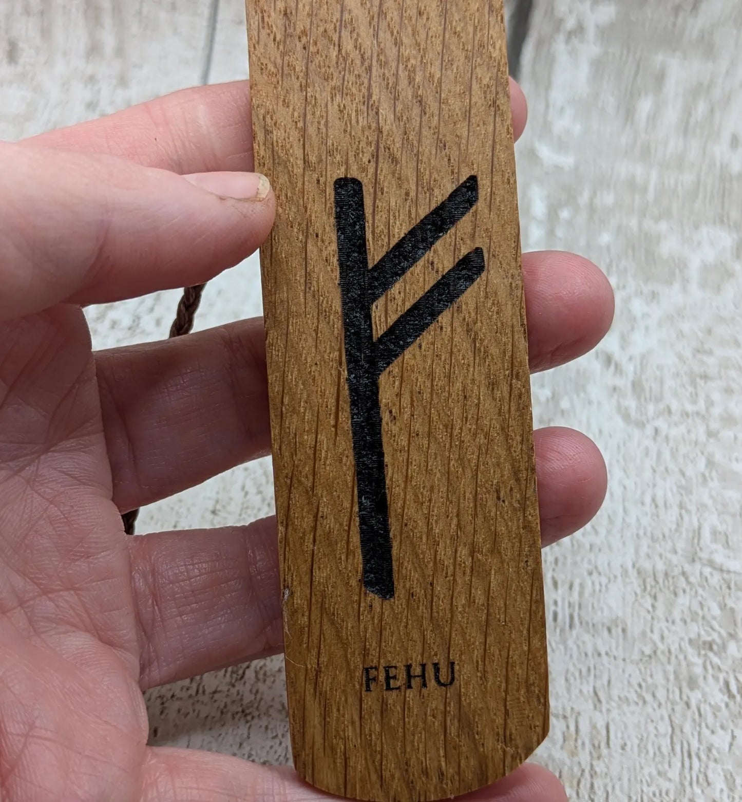 Handmade oak wood fehu rune bookmark.