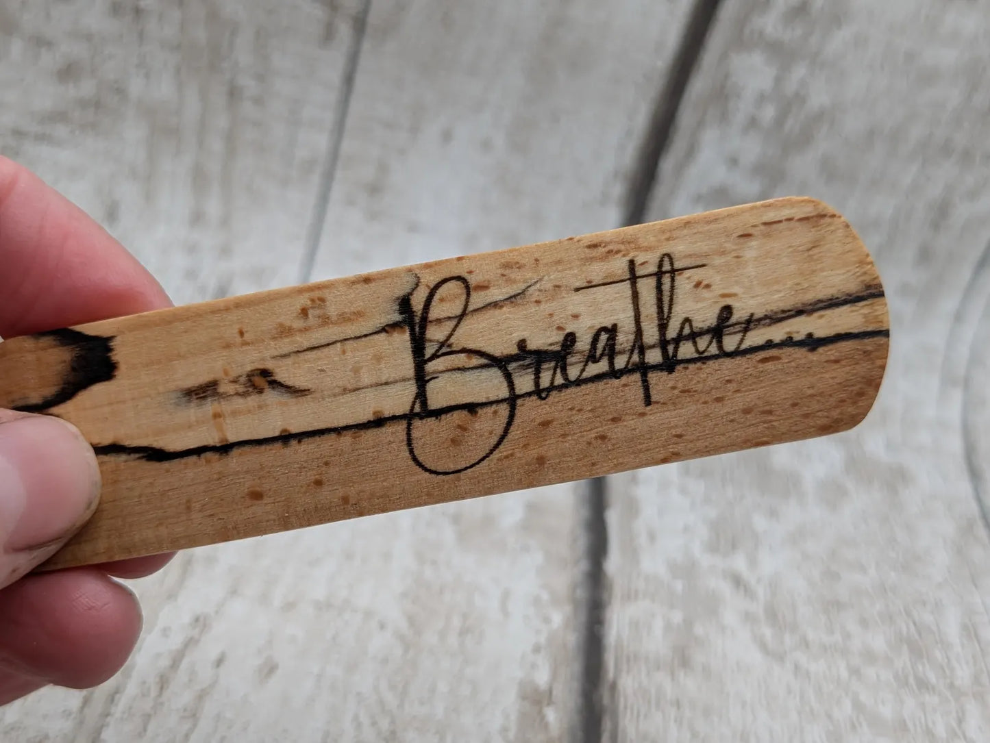 Spalted beech hand made wooden bookmark with laser printed breath mantra.