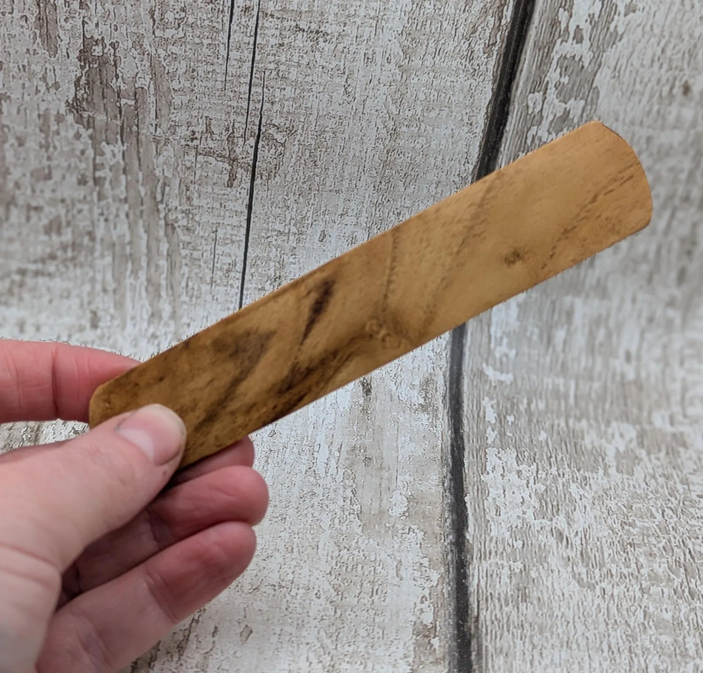 Handmade alder wooden laser printed breathe bookmark.