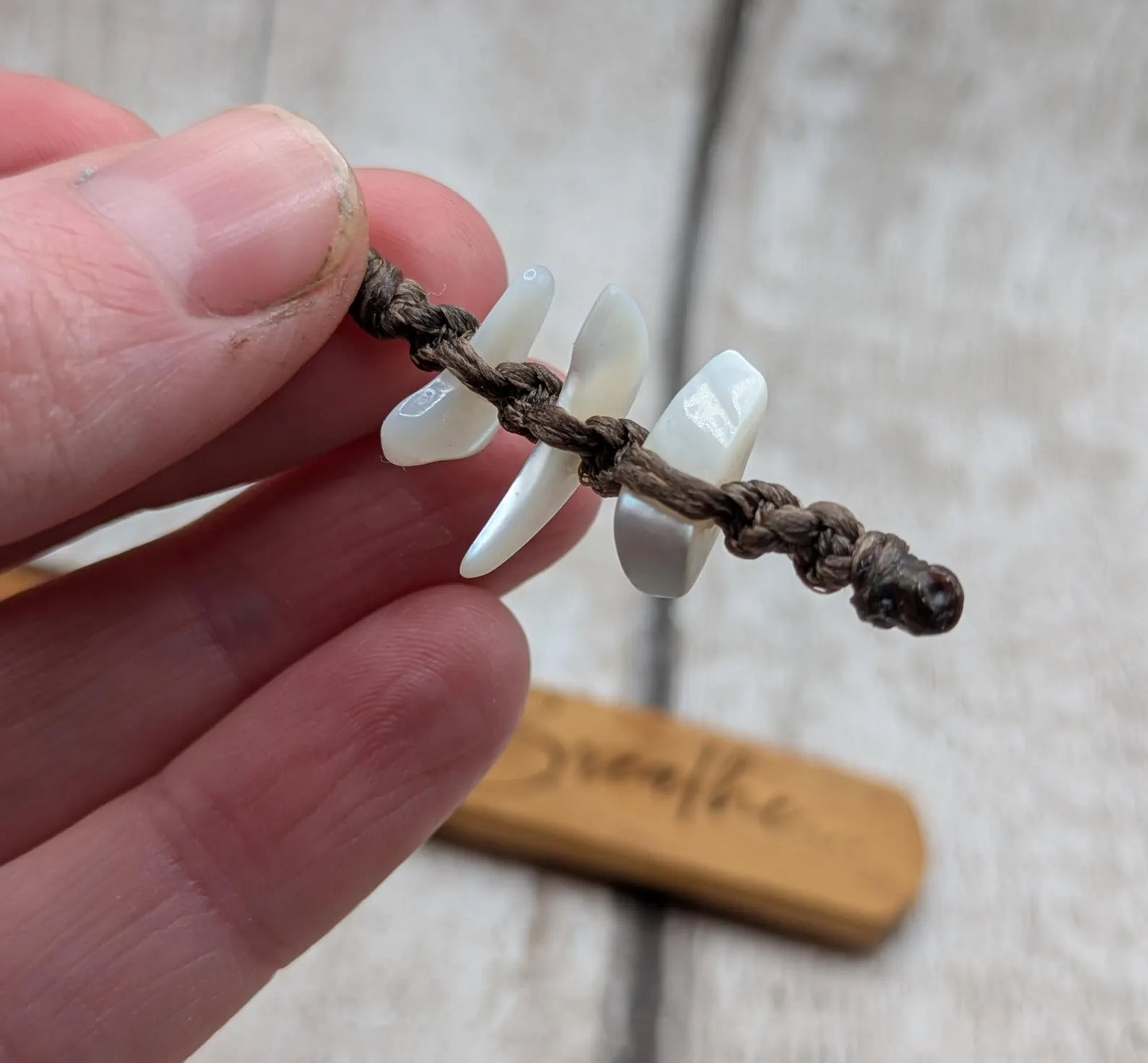 Handmade alder wooden laser printed breathe bookmark.
