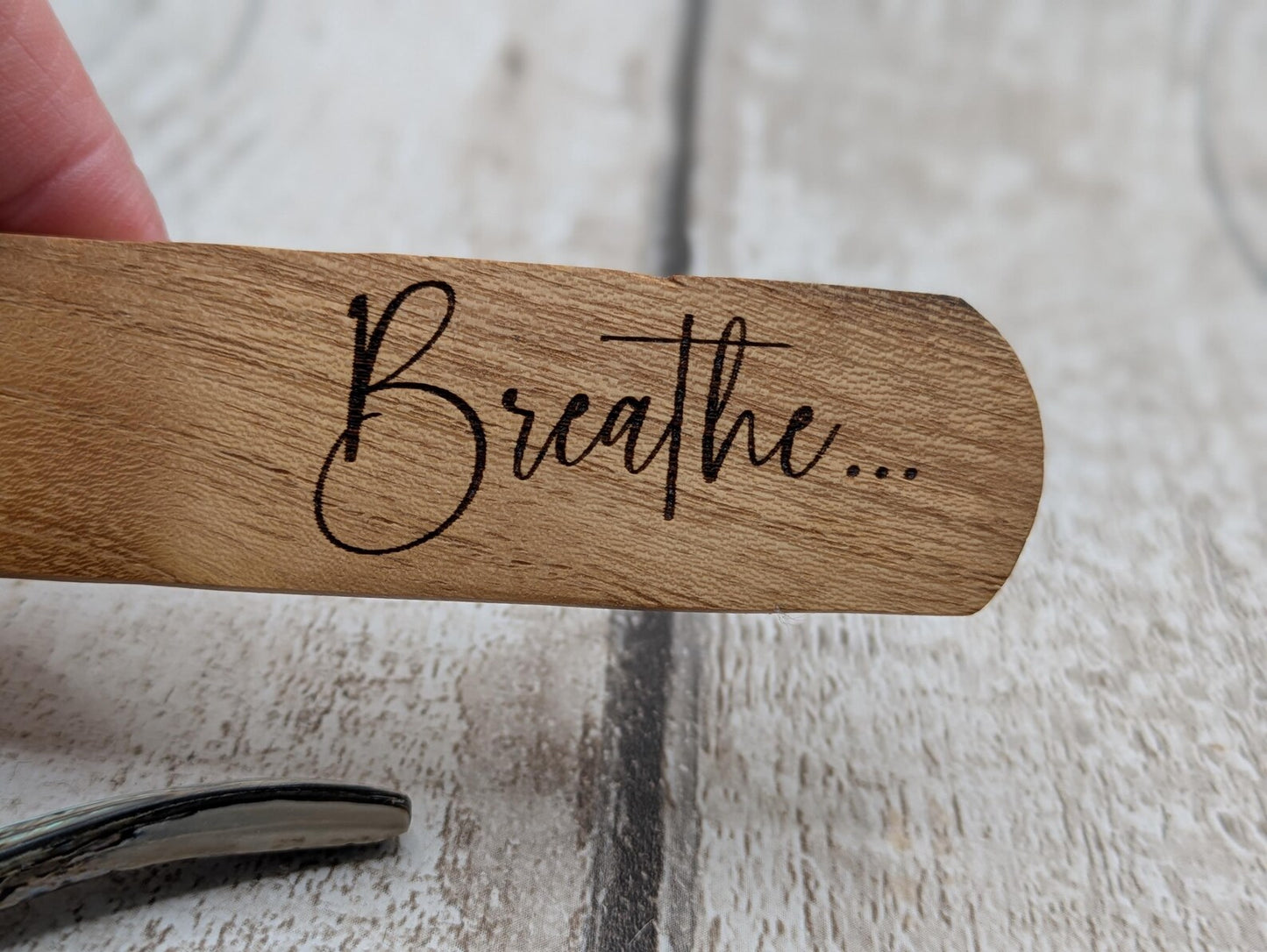 Handmade Alder wood book mark with laser printed breathe mantra.