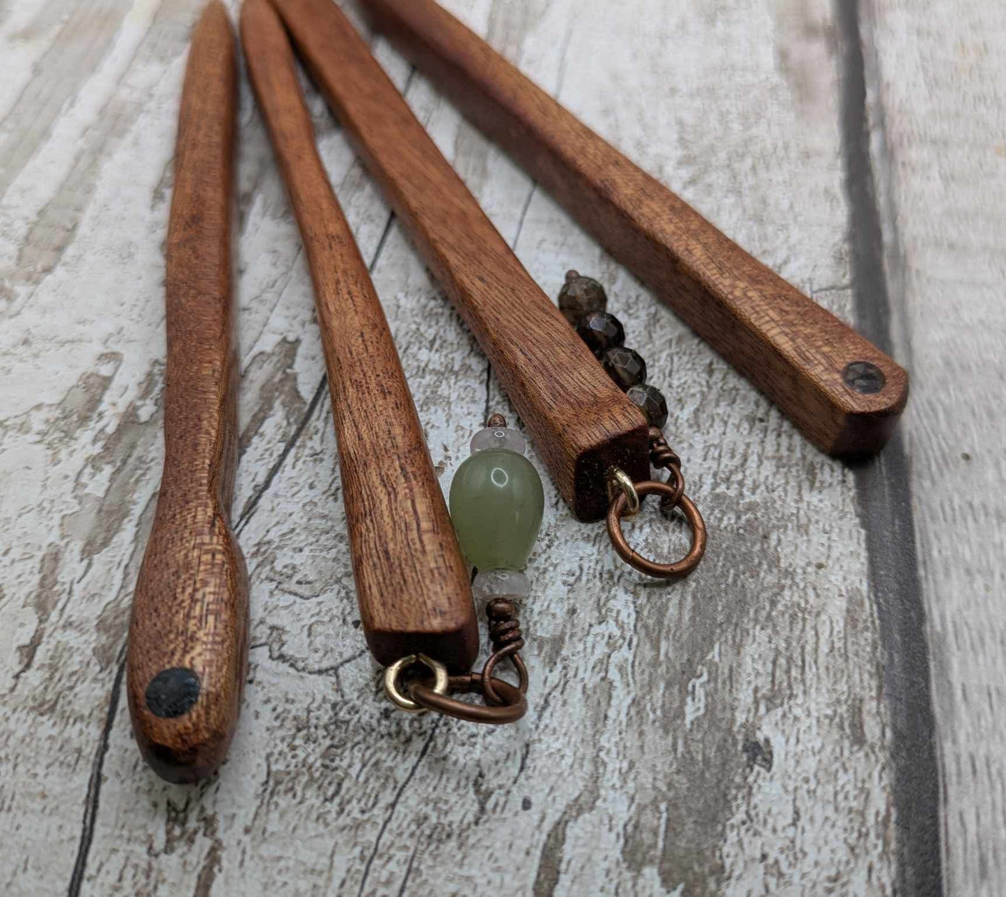 Sepele mahogany wood hair pin with Ethiopian opal inlay.