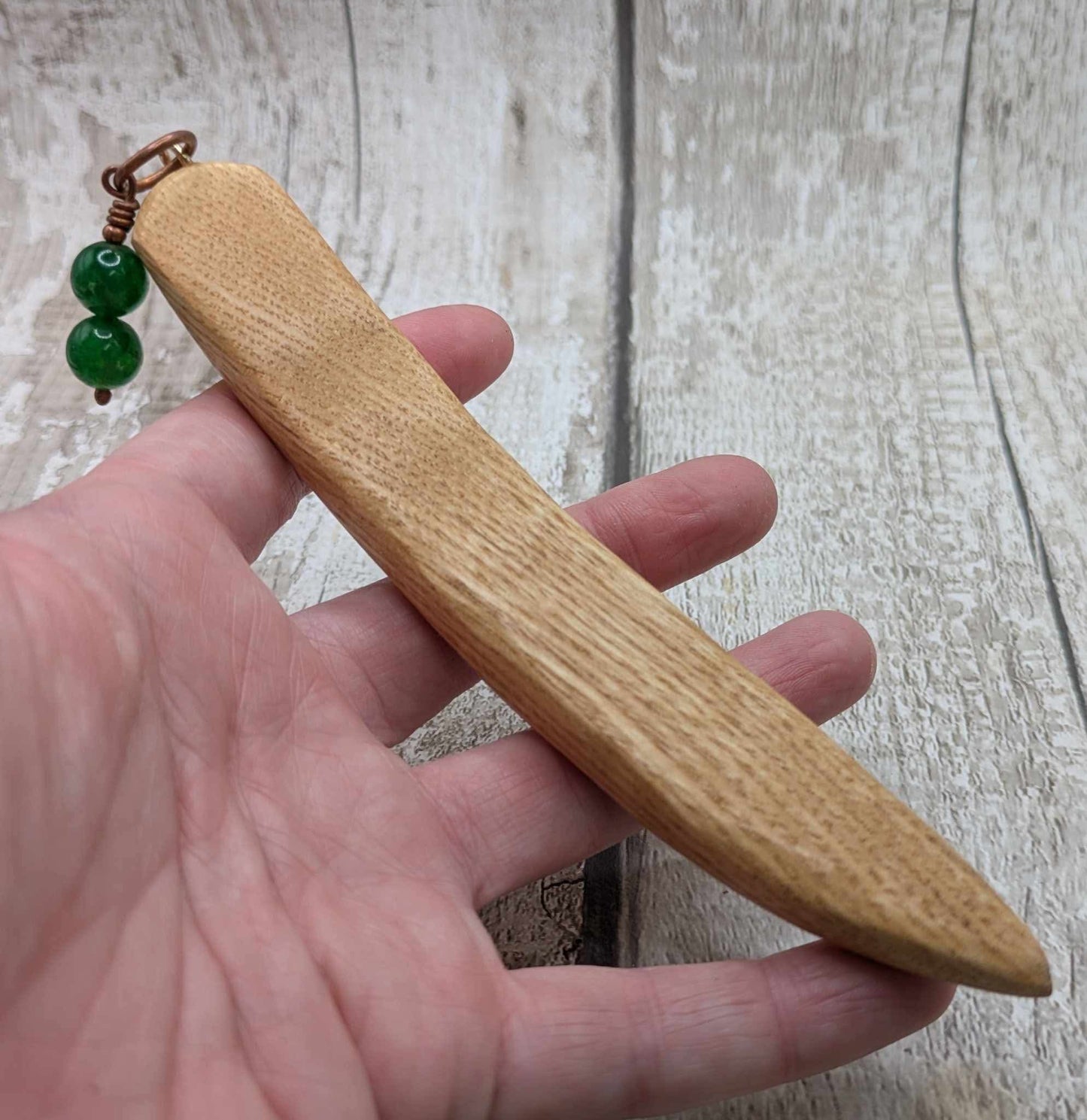 Oak wood curved hair stick with jade charm.