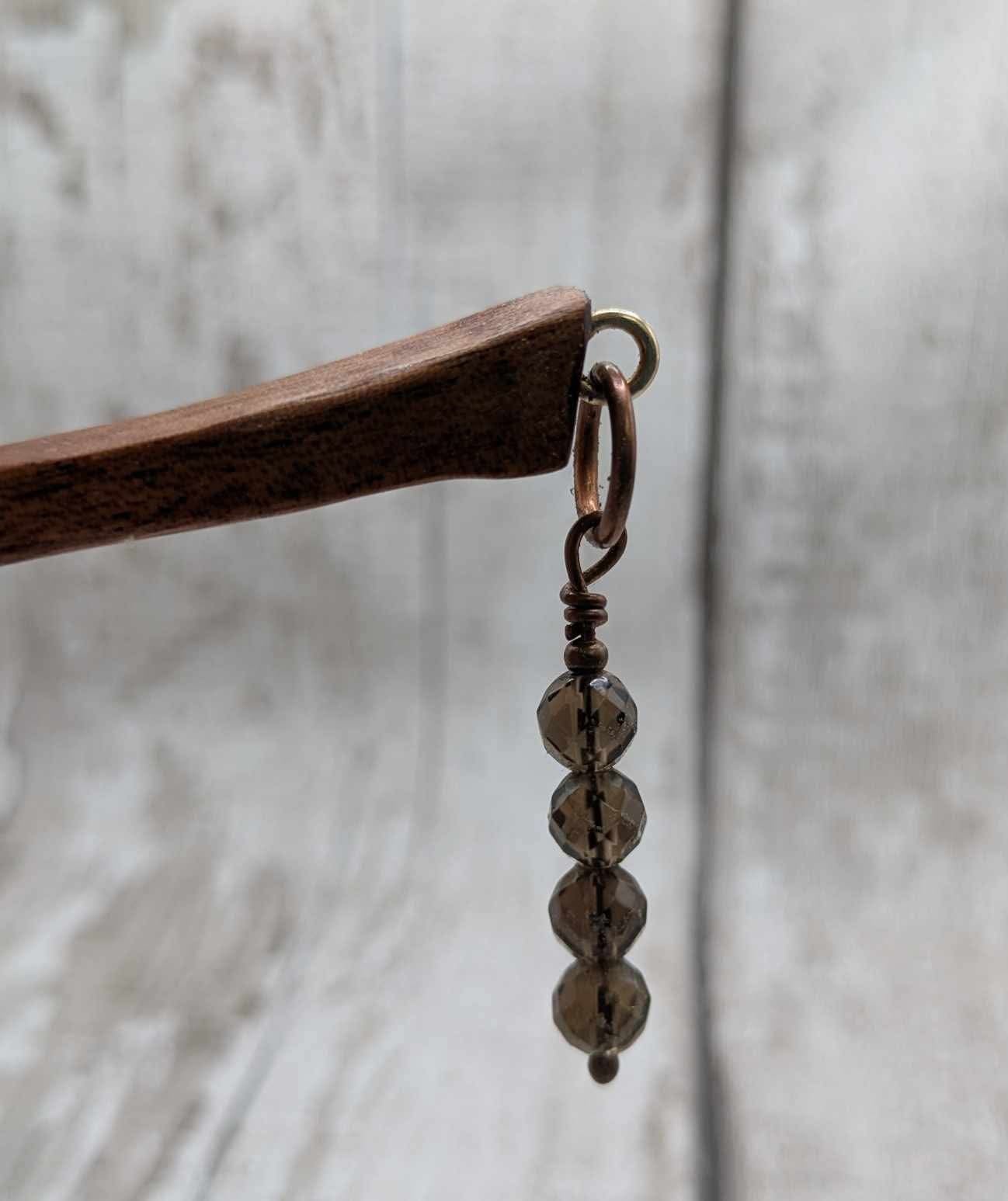 Sapele mahogany hair pin with Smokey quartz charm.