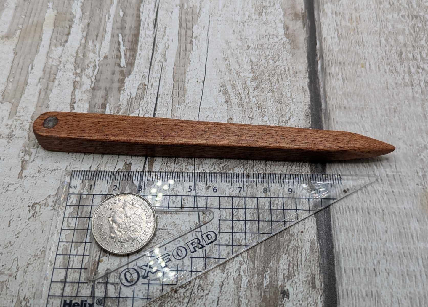 Sepele mahogany wood hair pin with Ethiopian opal inlay.