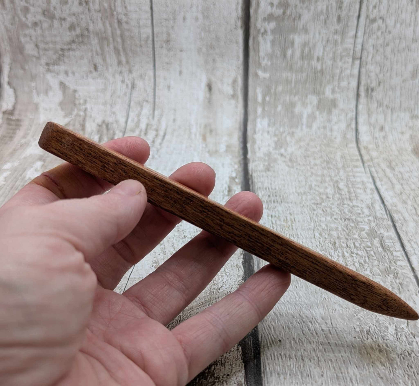 Sepele mahogany wood hair pin with Ethiopian opal inlay.