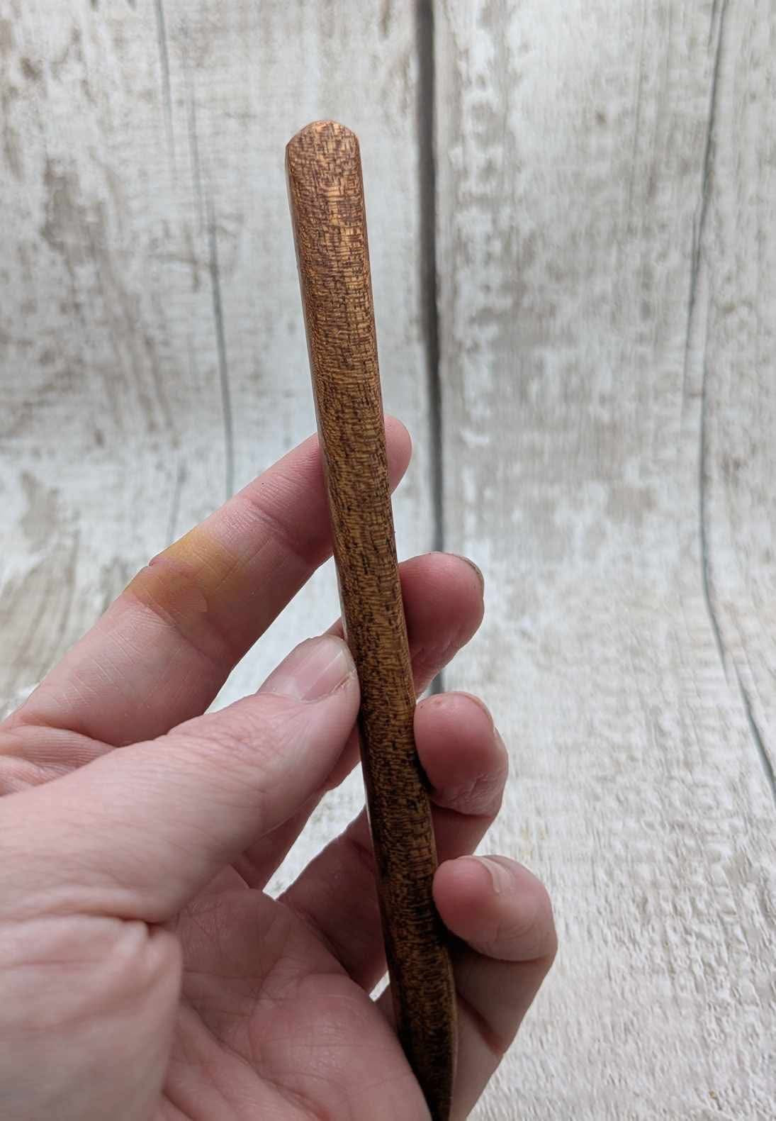 Sepele mahogany wod hair pin with abalone shell.