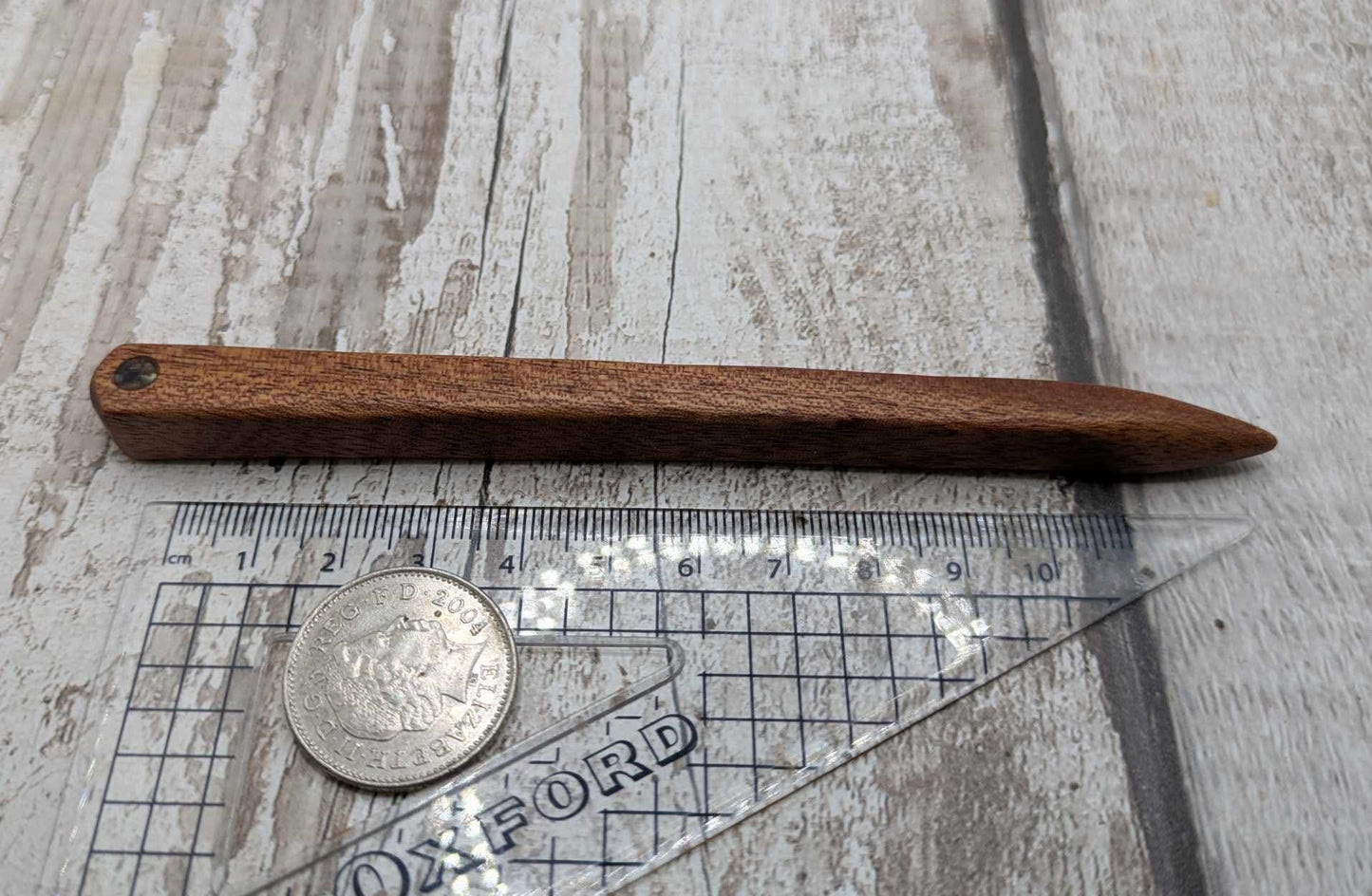 Sepele mahogany wod hair pin with abalone shell.