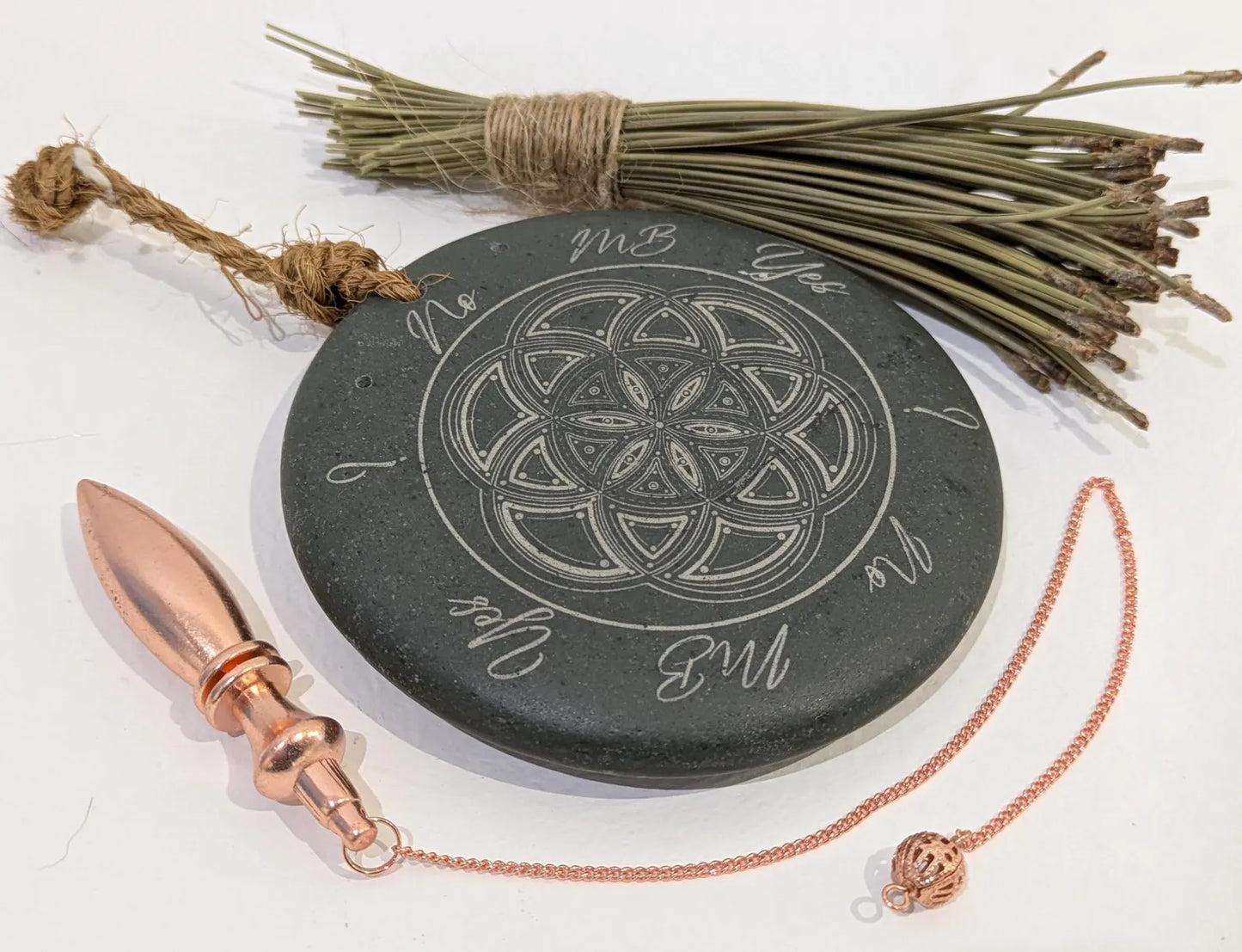 Welsh slate laser printed dowsing board with geometric print and incence holder.