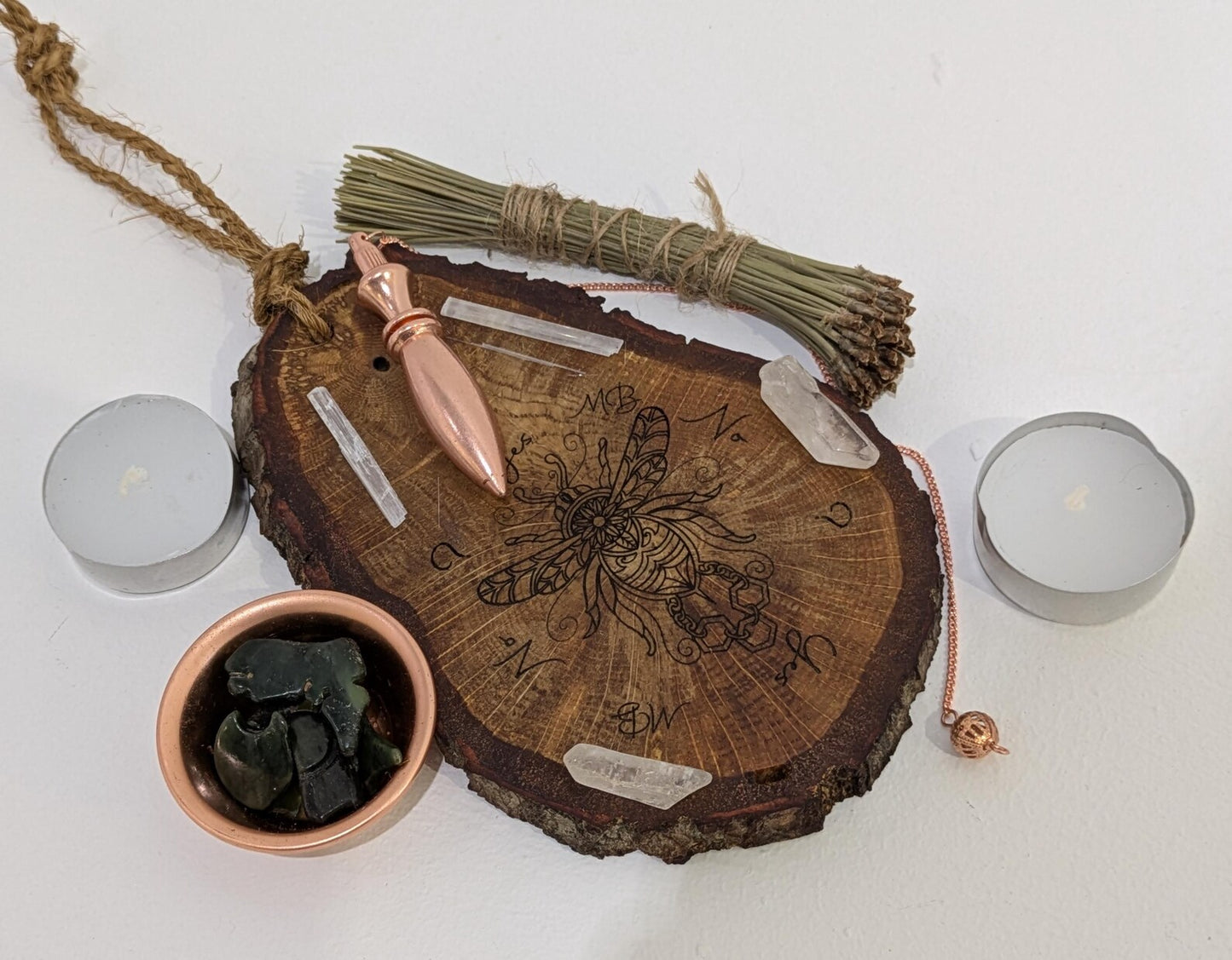 Oak wood slice with bumble bee detail, dowsing boards and incense holder.
