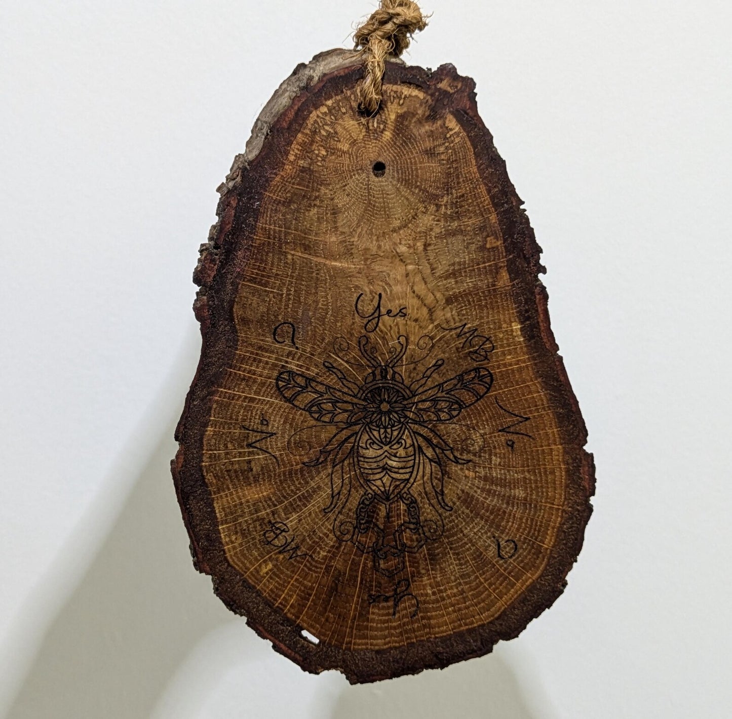 Oak wood slice with bumble bee detail, dowsing boards and incense holder.