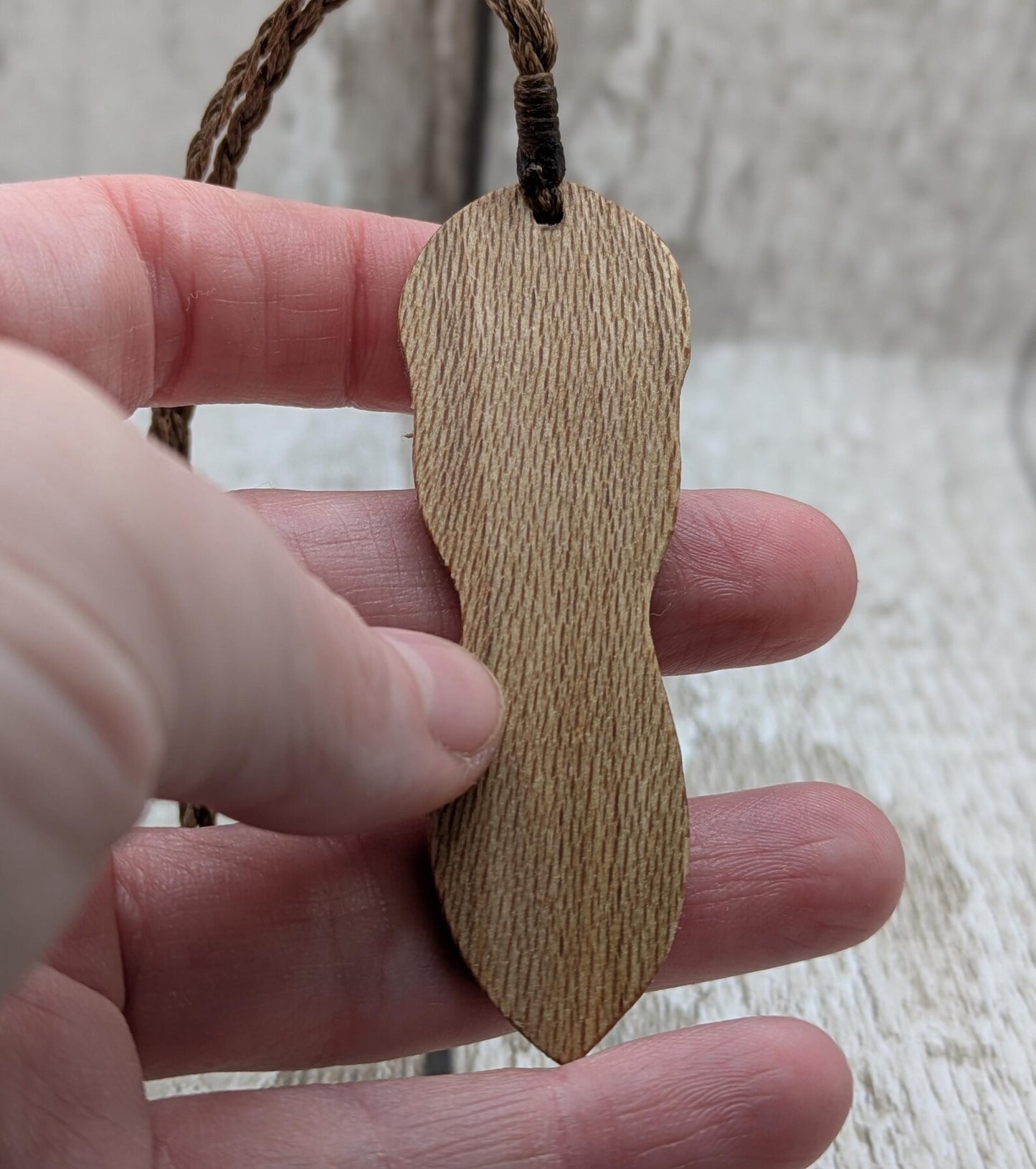 Recycled Lace wood, deity goddess 2d pendant holding the seed of life globe.
