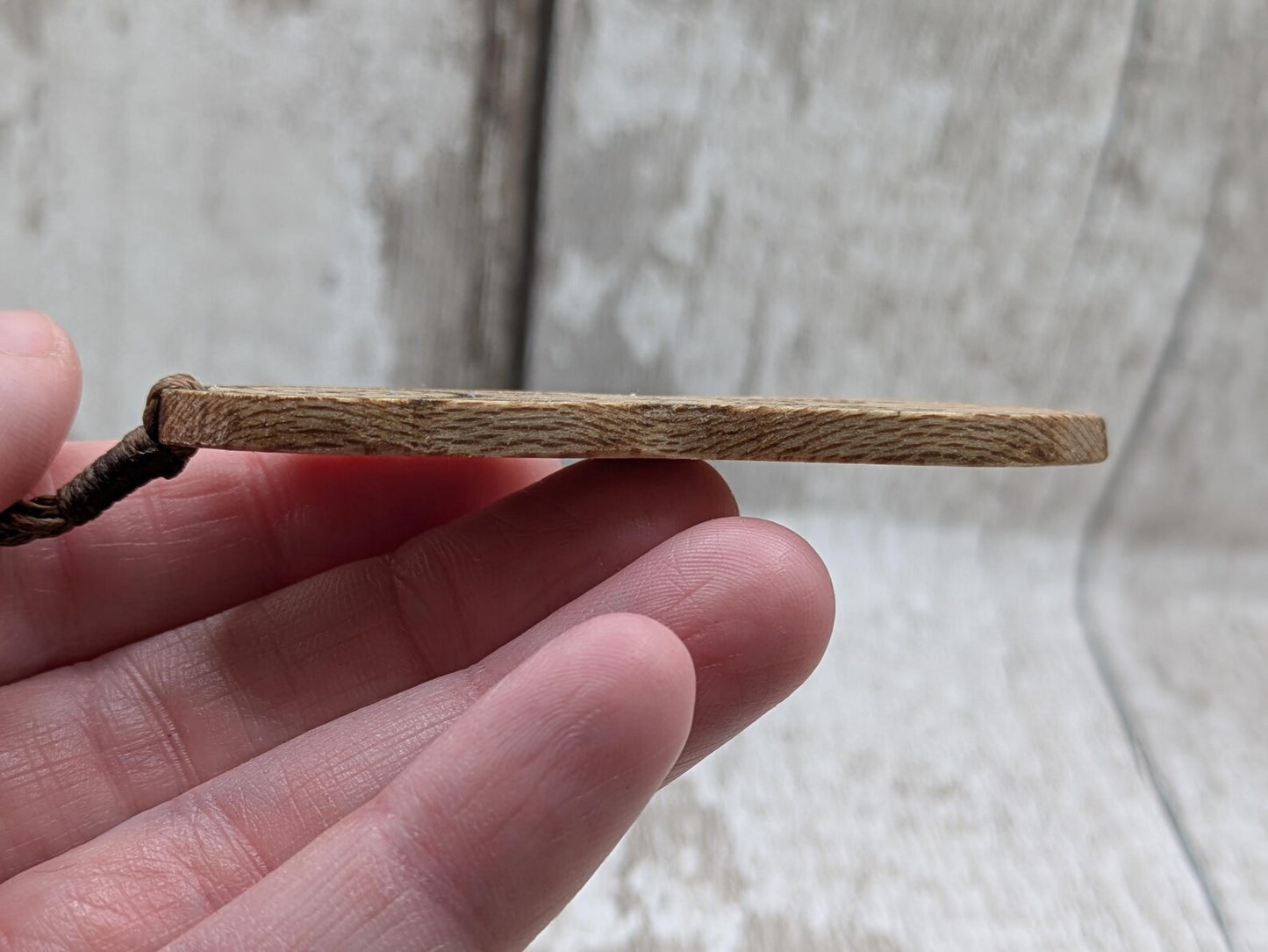 Recycled Lace wood, deity goddess 2d pendant holding the seed of life globe.