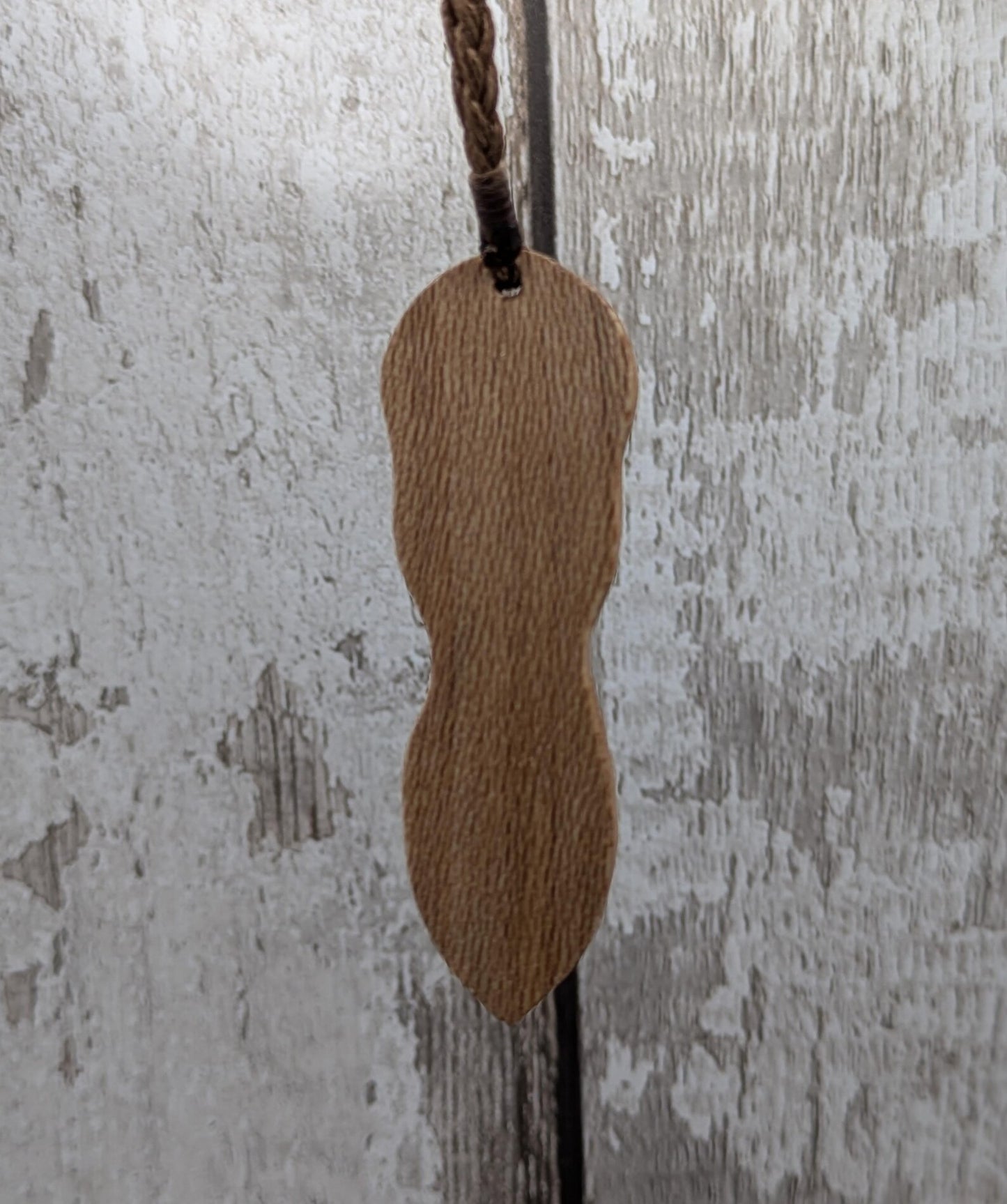 Recycled Lace wood, deity goddess 2d pendant holding the seed of life globe.