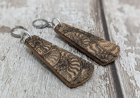 Lace wood Wooden roimata ammonite laser printed drop earrings with stainless steel findings.