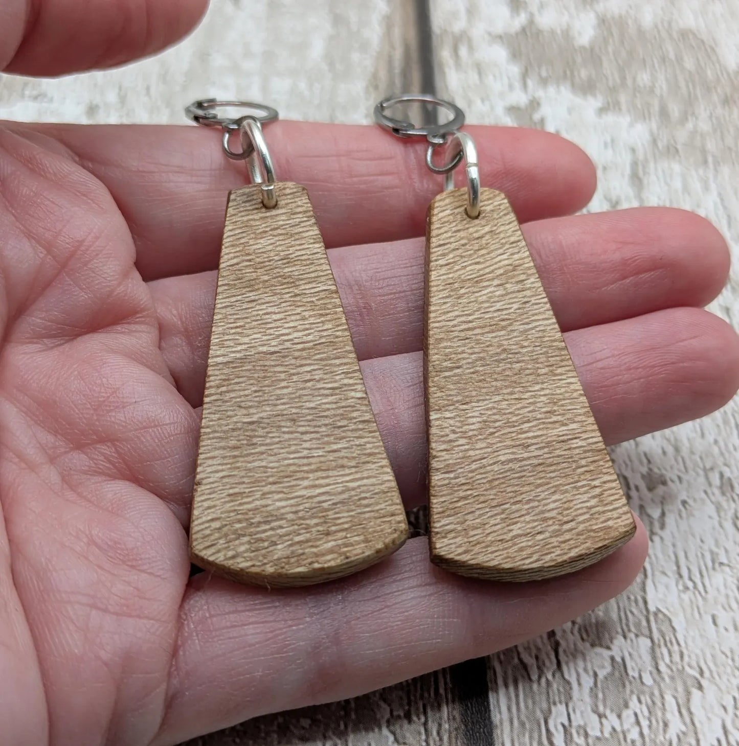 Lace wood Wooden roimata ammonite laser printed drop earrings with stainless steel findings.