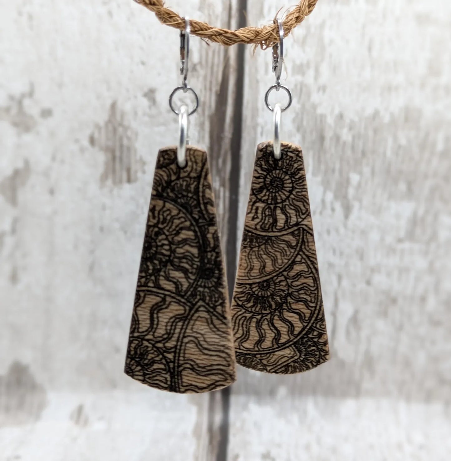 Lace wood Wooden roimata ammonite laser printed drop earrings with stainless steel findings.