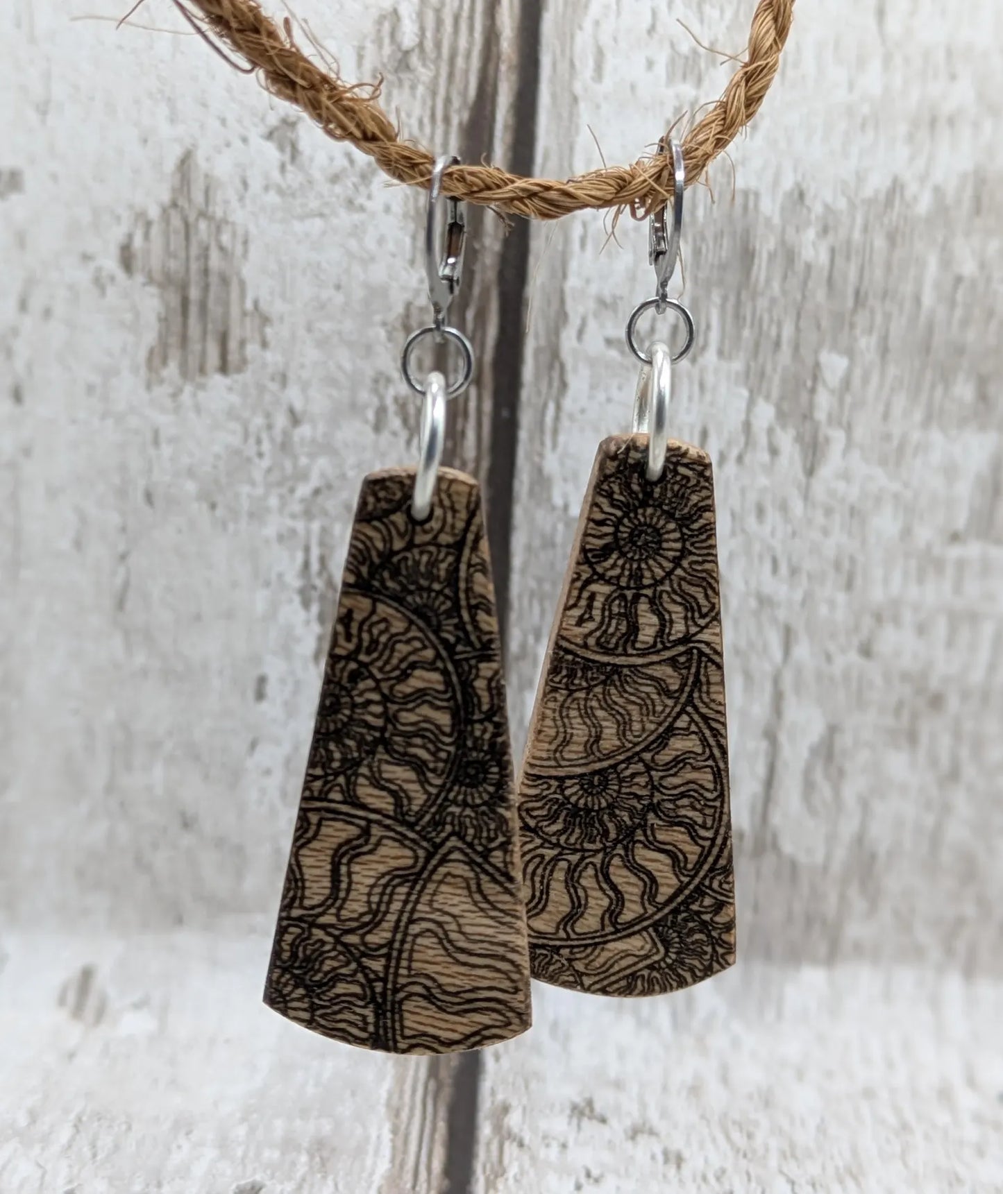 Lace wood Wooden roimata ammonite laser printed drop earrings with stainless steel findings.
