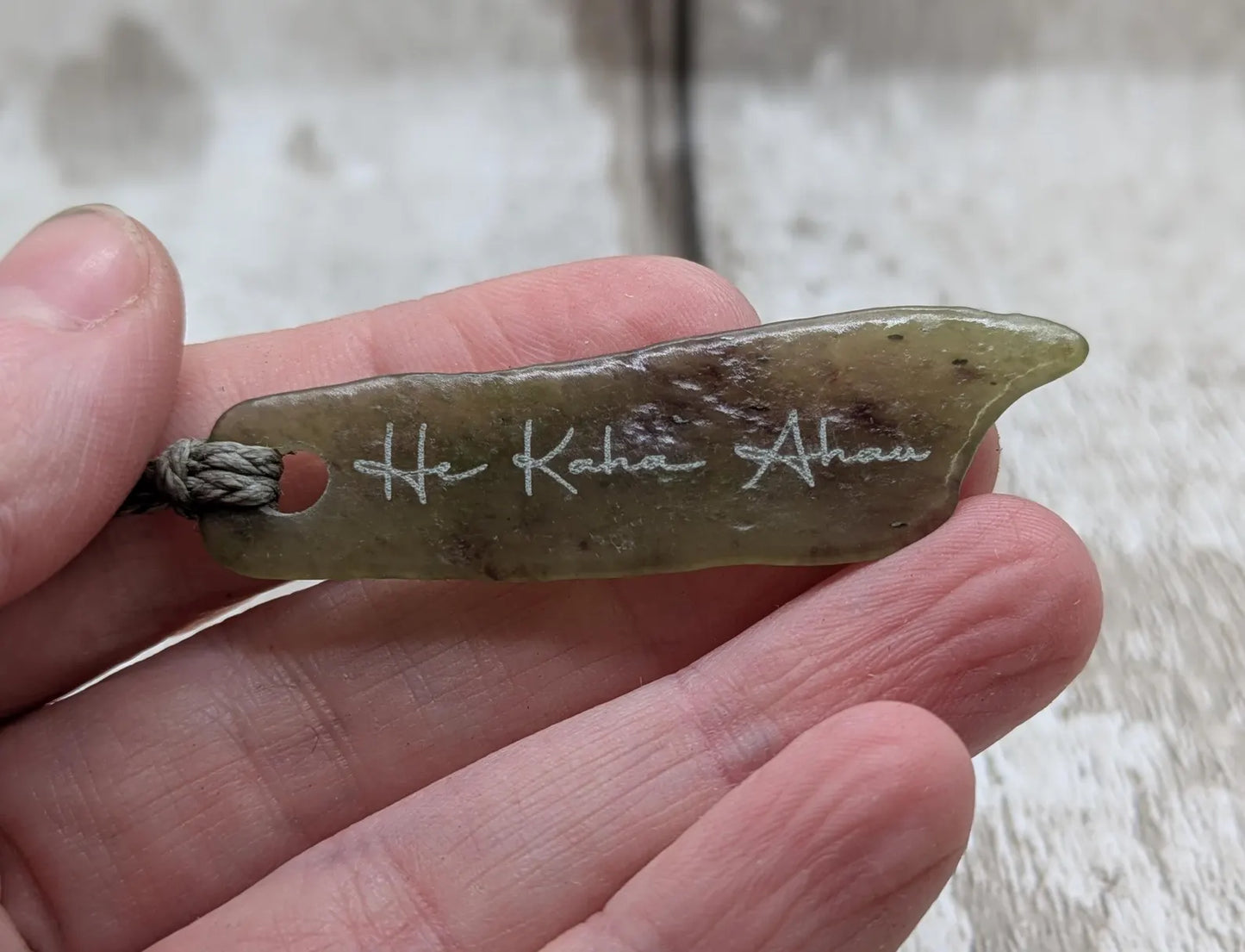 New Zealand pounamu greenstone jade pendant, he kaha ahau, I am strong affirmation.