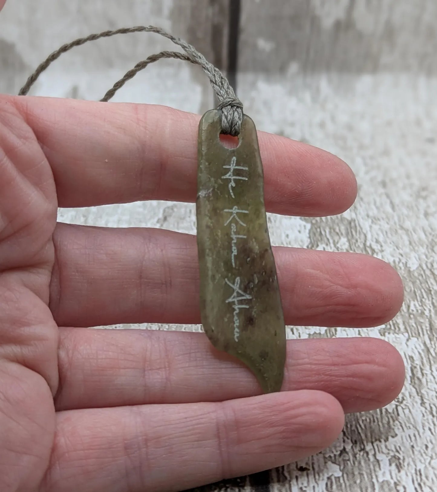 New Zealand pounamu greenstone jade pendant, he kaha ahau, I am strong affirmation.