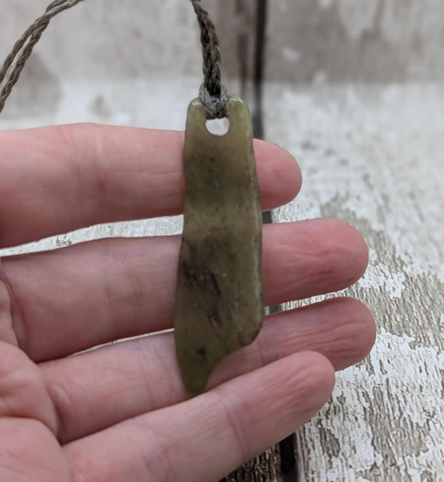New Zealand pounamu greenstone jade pendant, he kaha ahau, I am strong affirmation.