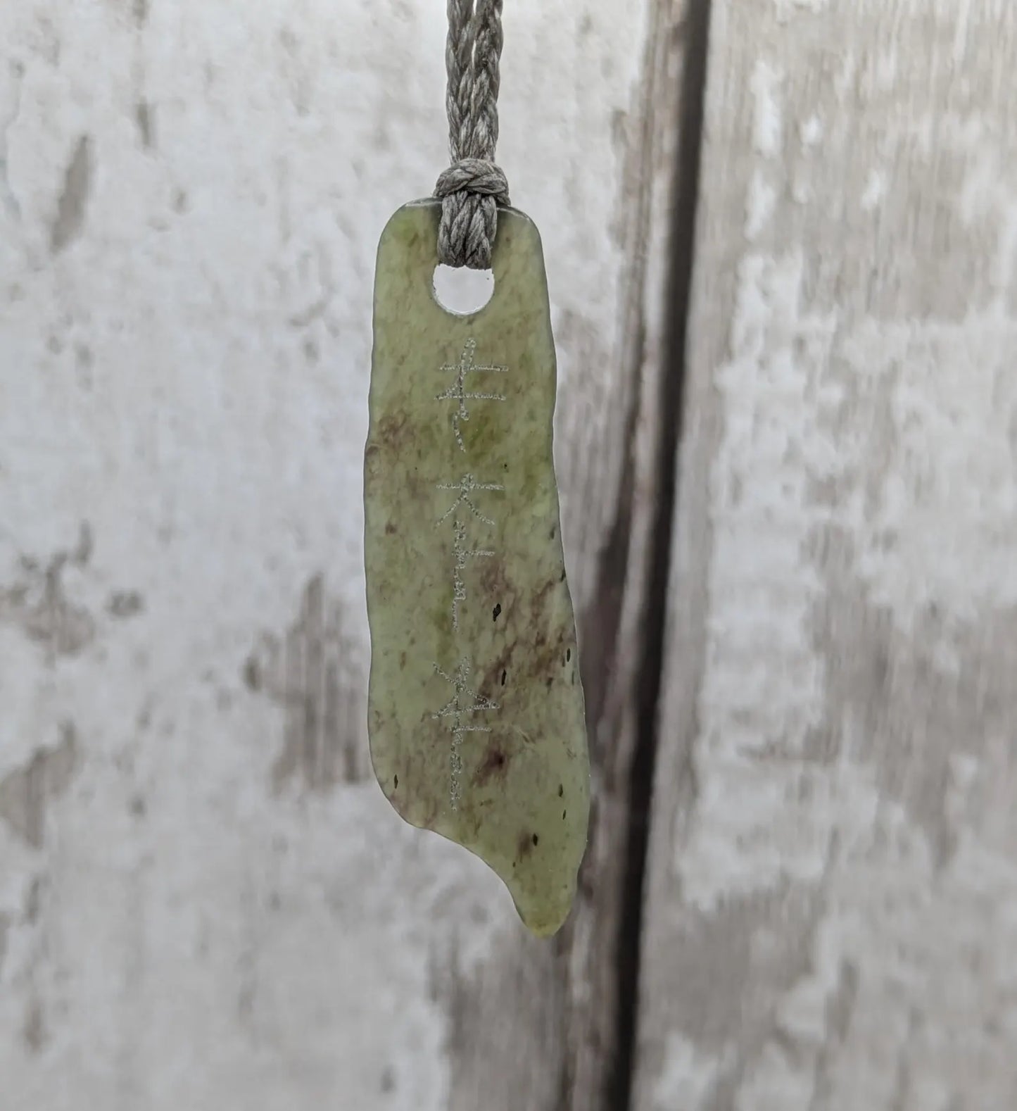 New Zealand pounamu greenstone jade pendant, he kaha ahau, I am strong affirmation.