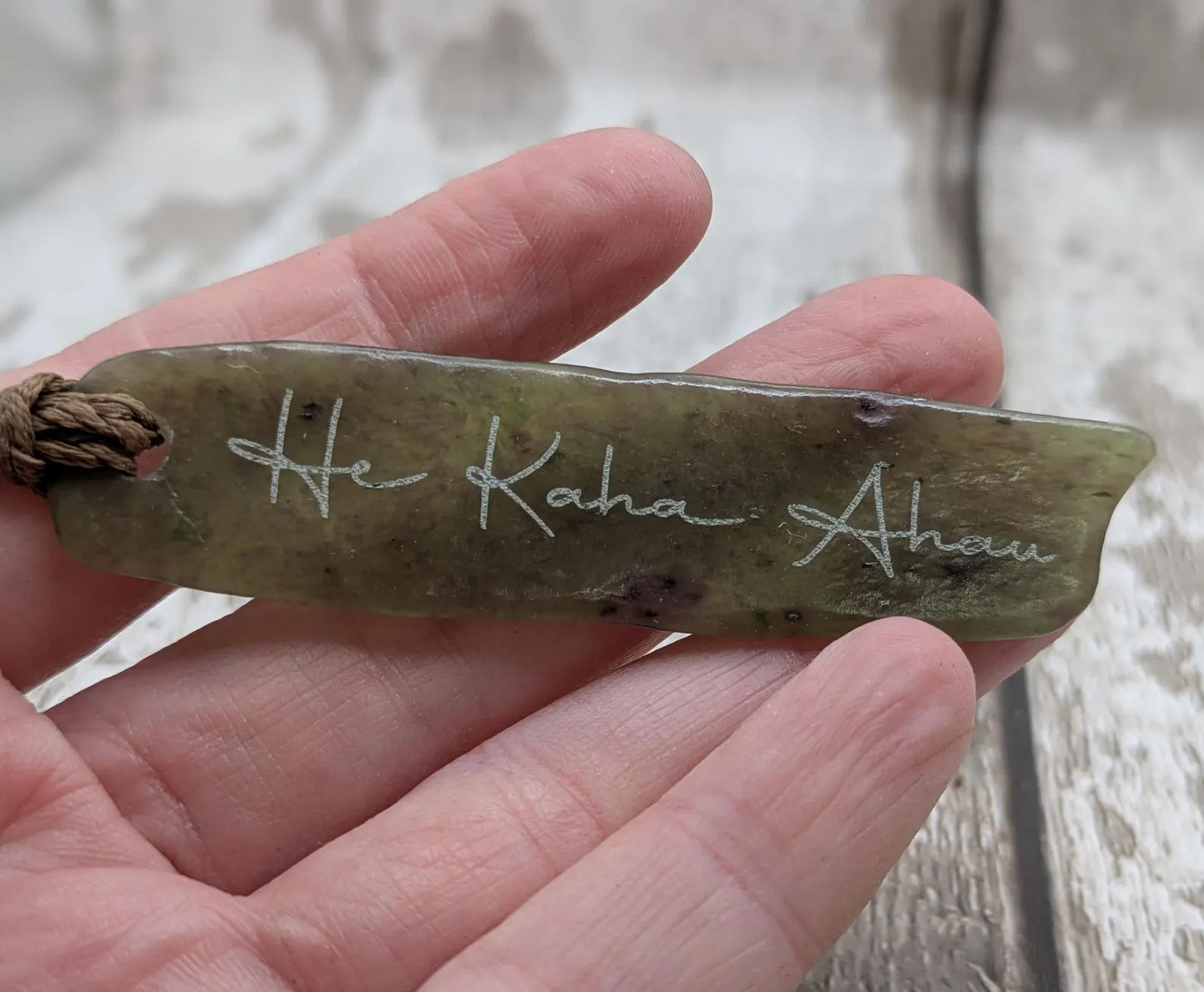 New Zealand pounamu greenstone jade pendant, he kaha ahau, I am strong affirmation.