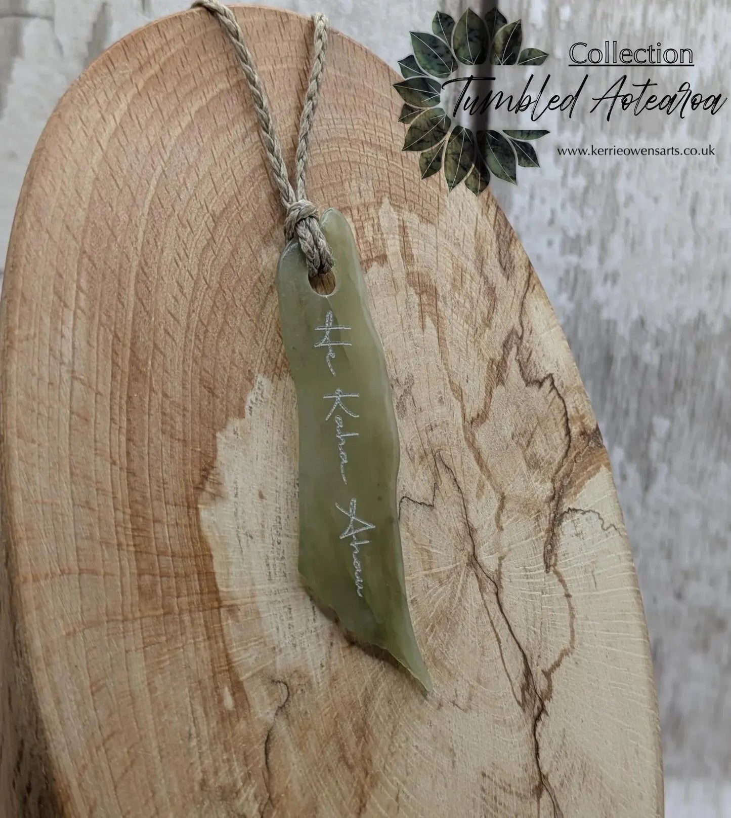 New Zealand tumbled Pounamu greenstone pendant with I am strong in te Reo Māori.