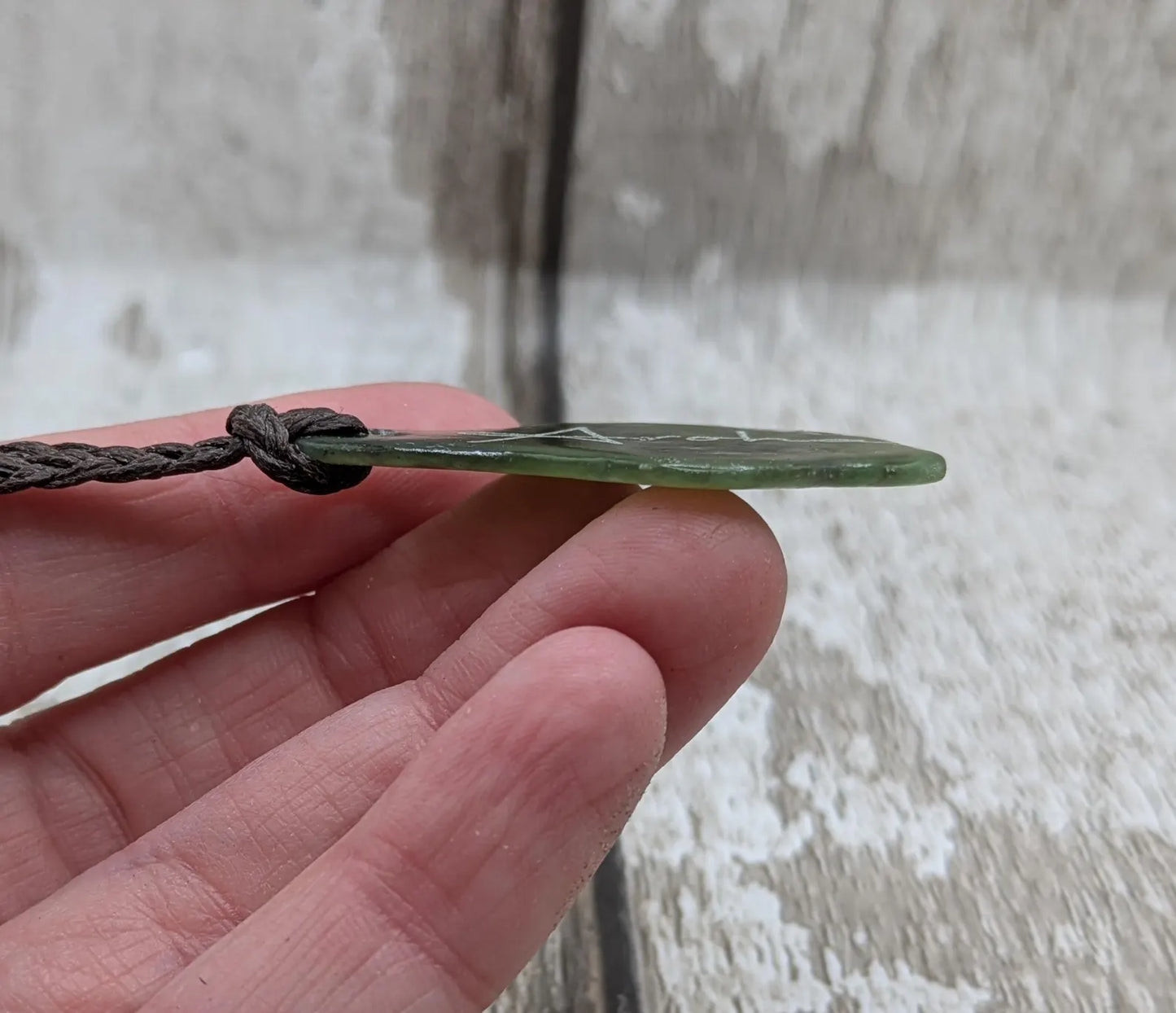Tumbled New Zealand Pounamu greenstone pendant with love in te Reo Māori