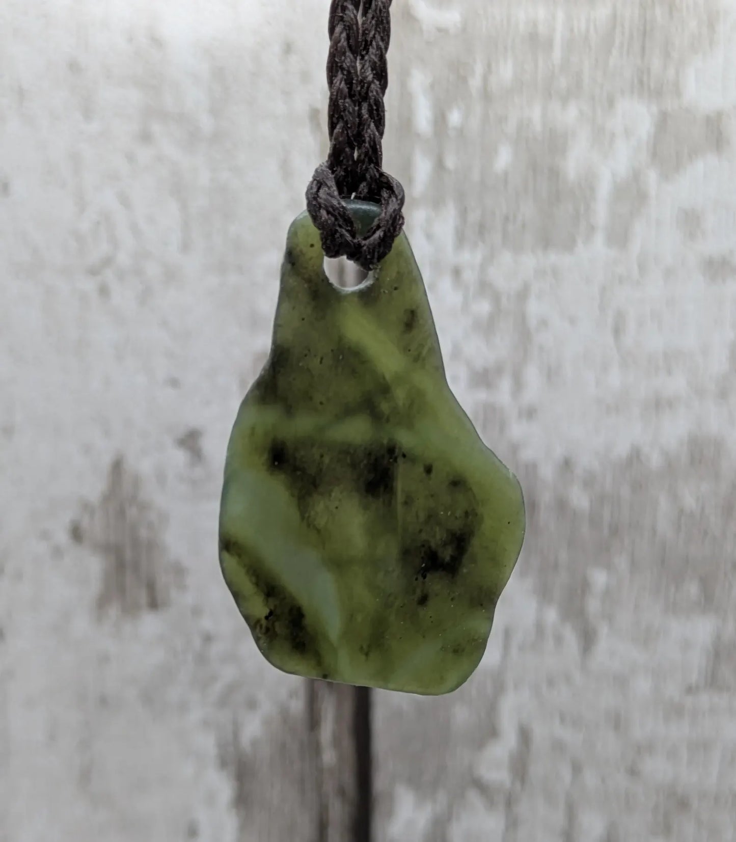 Tumbled New Zealand Pounamu greenstone pendant with love in te Reo Māori