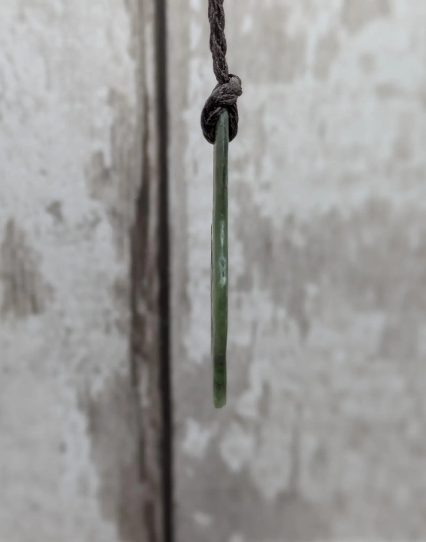 Tumbled New Zealand Pounamu greenstone pendant with love in te Reo Māori