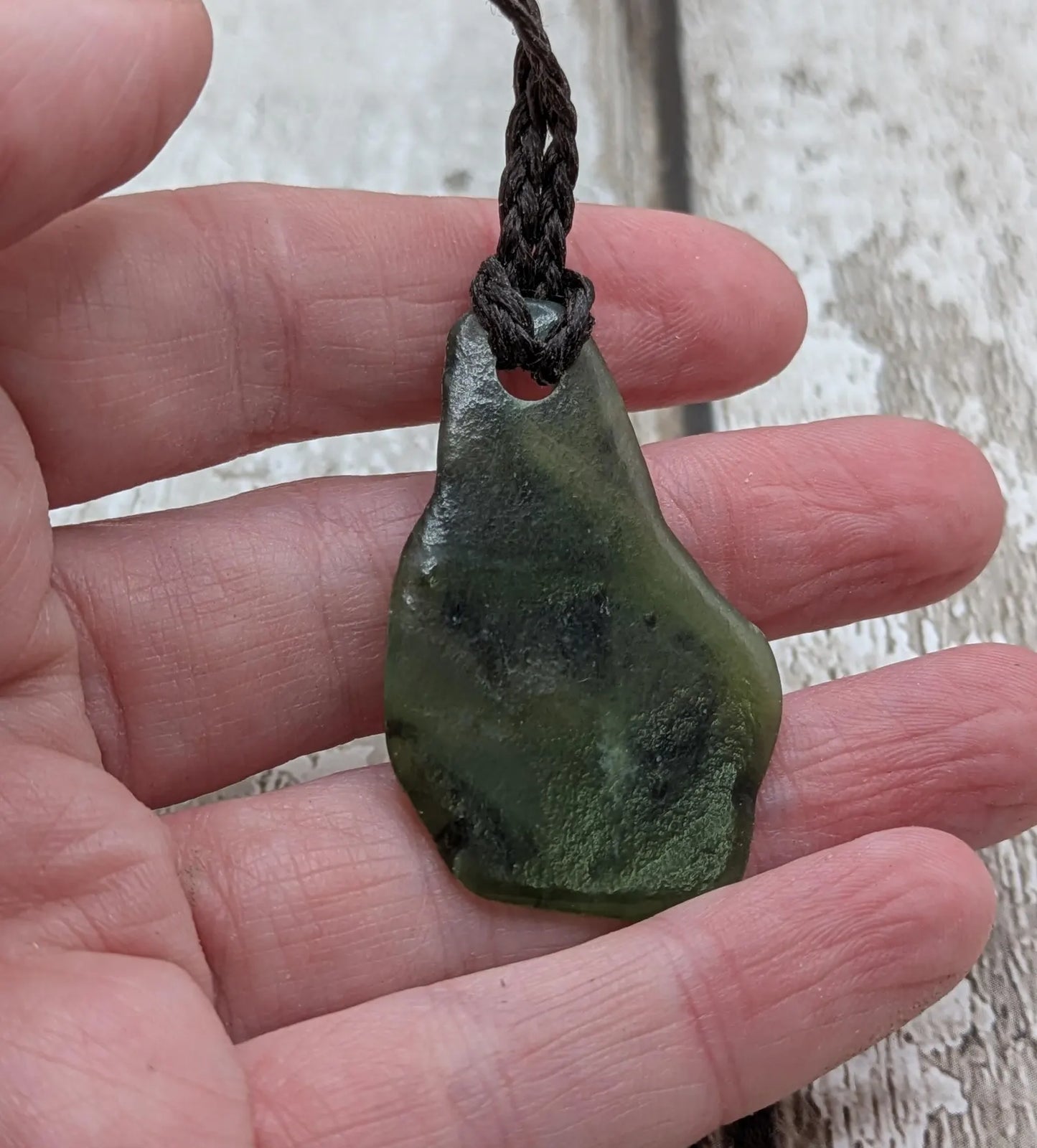 Tumbled New Zealand Pounamu greenstone pendant with love in te Reo Māori