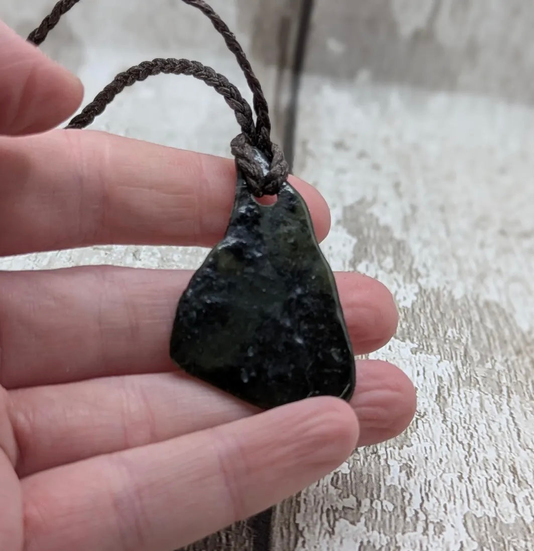 Nz tumbled Pounamu greenstone pendant with Aroha love affirmation.