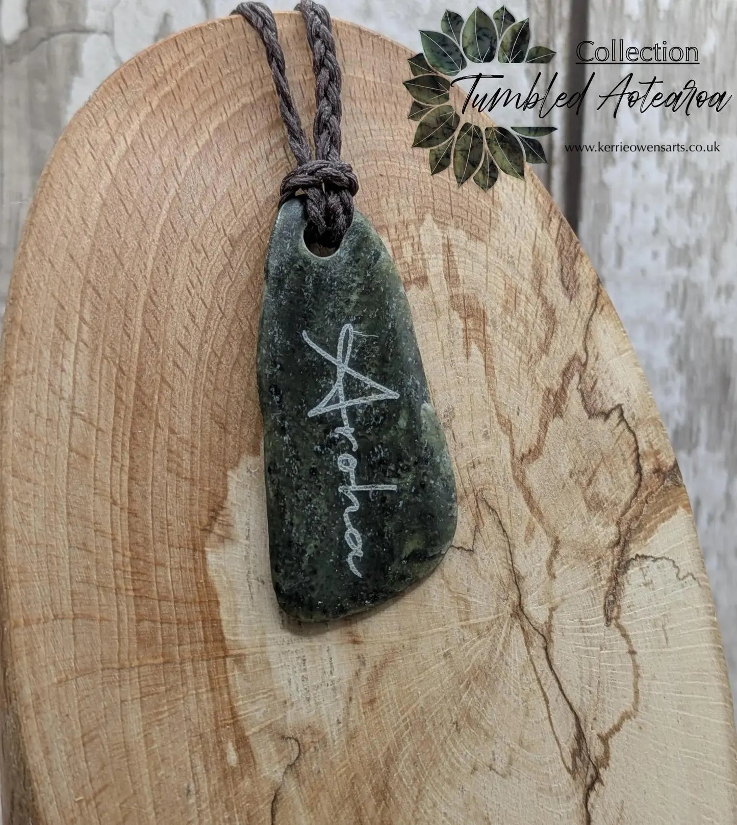 Nz tumble polished Pounamu jade pendant with Aroha love affirmation.