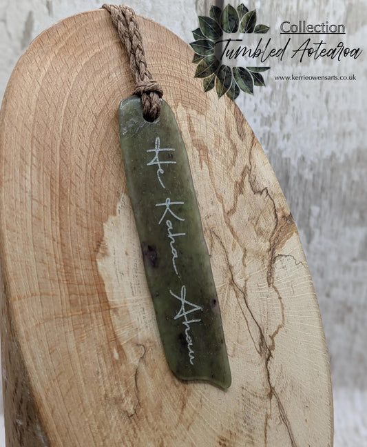 Tumble polished New Zealand Pounamu greenstone jade slice pendant with I am strong in te Reo Māori