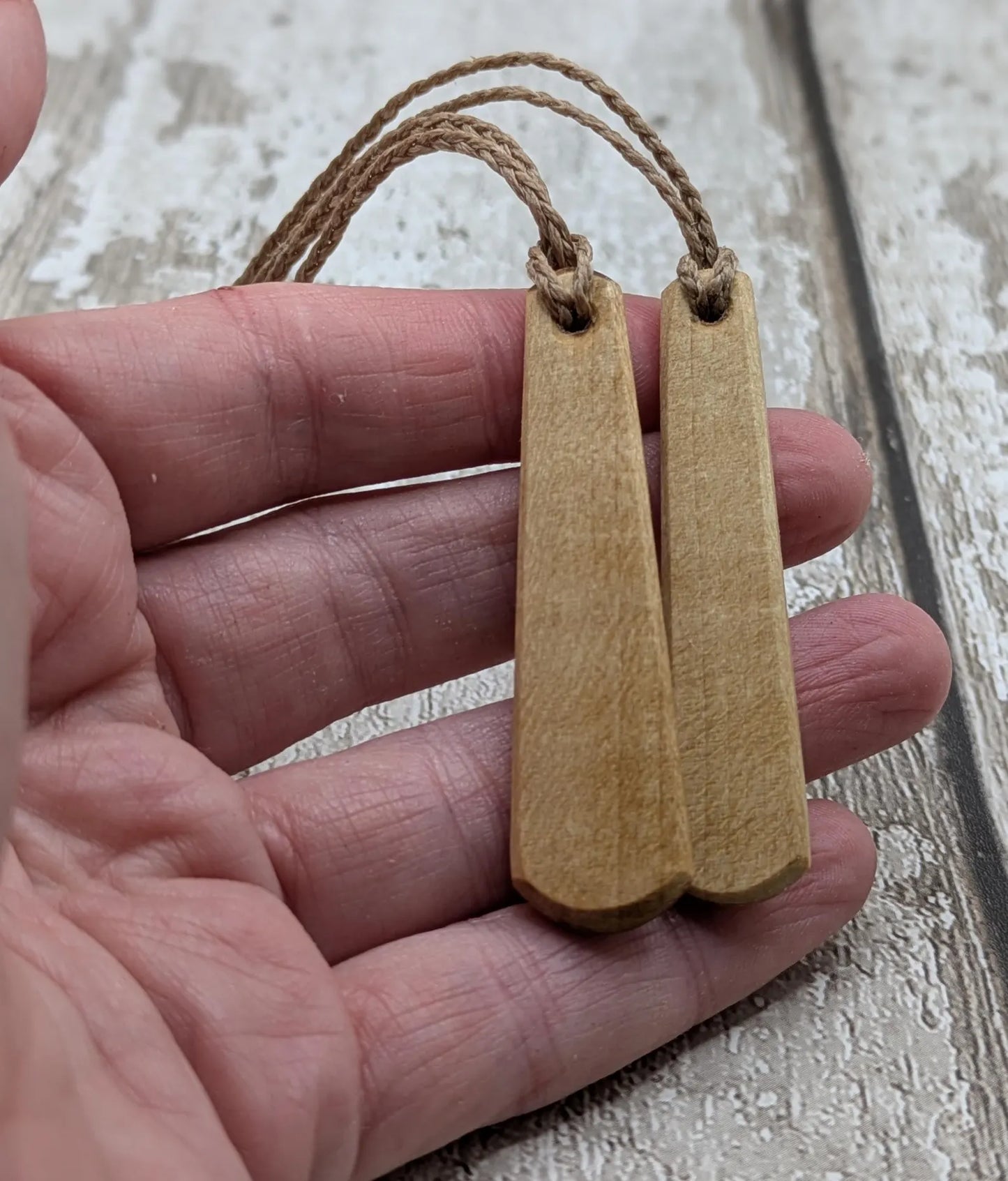 Lime wood Scots Gaelic Tha Mi Láidir, I am strong roimata drop pendant.