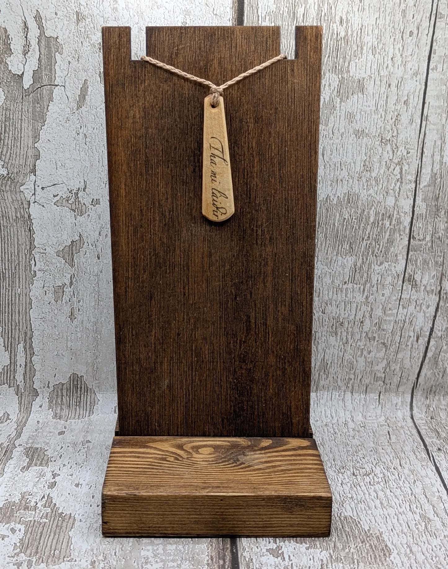 Lime wood Scots Gaelic Tha Mi Láidir, I am strong roimata drop pendant.