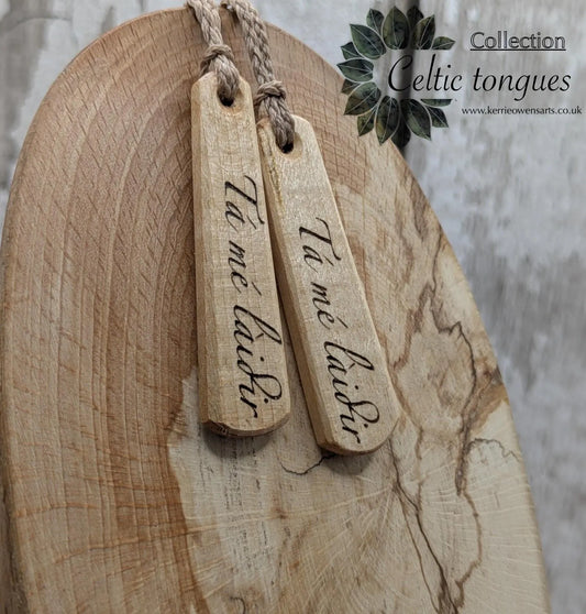 Lime wood Irish Gaeilic Tá mé Làidir, i am strong roimata pendant.