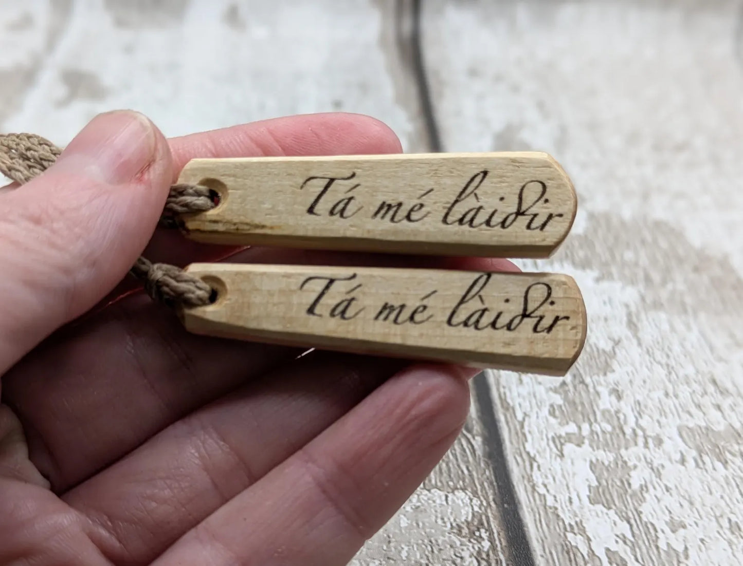 Lime wood Irish Gaeilic Tá mé Làidir, i am strong roimata pendant.