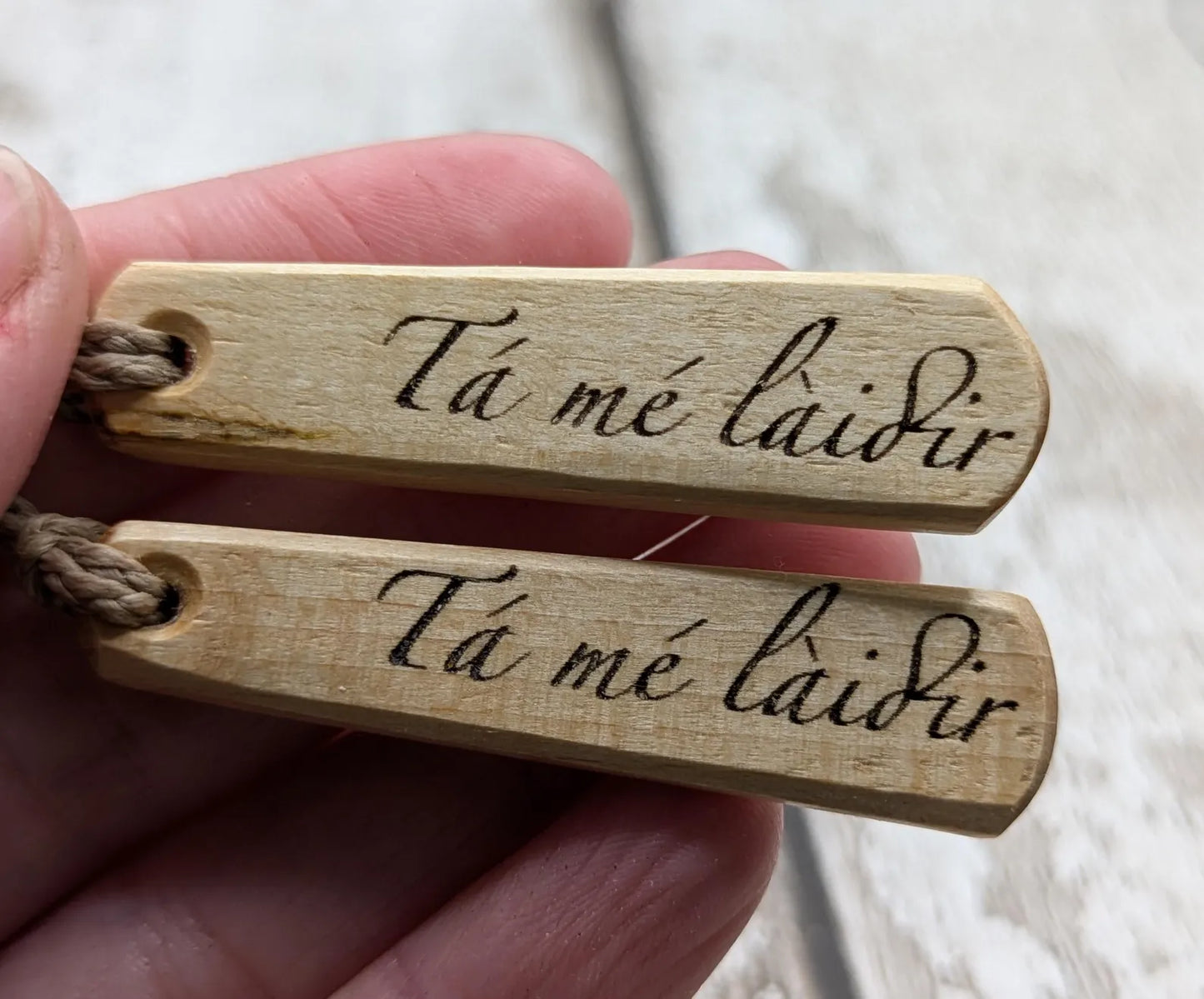 Lime wood Irish Gaeilic Tá mé Làidir, i am strong roimata pendant.