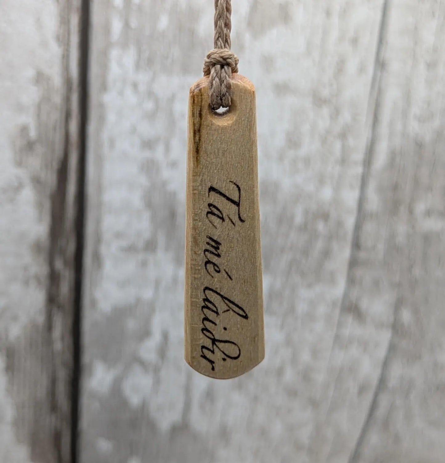 Lime wood Irish Gaeilic Tá mé Làidir, i am strong roimata pendant.