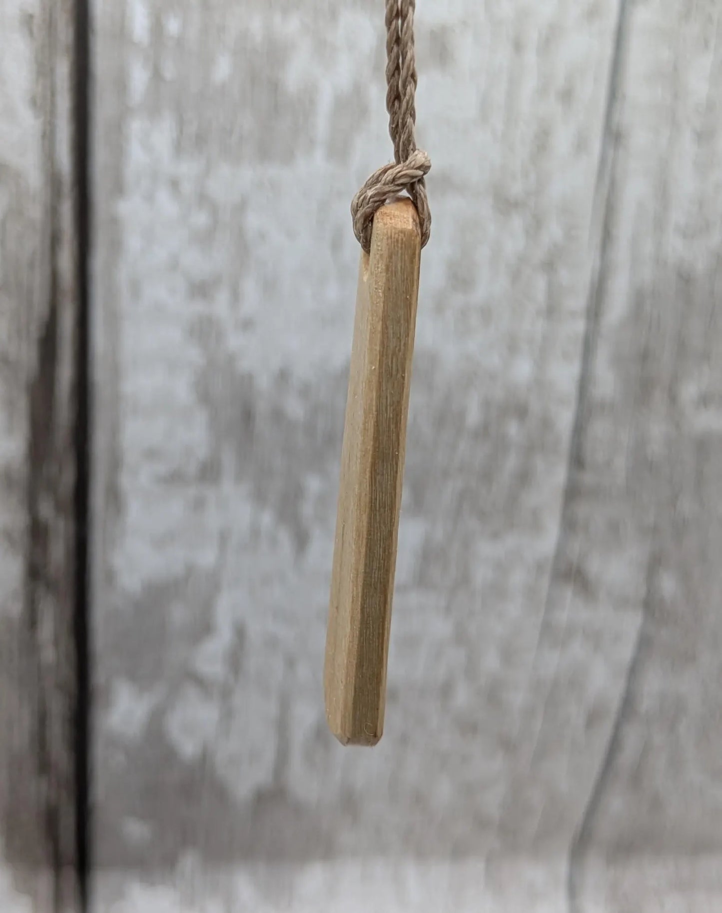 Lime wood Irish Gaeilic Tá mé Làidir, i am strong roimata pendant.