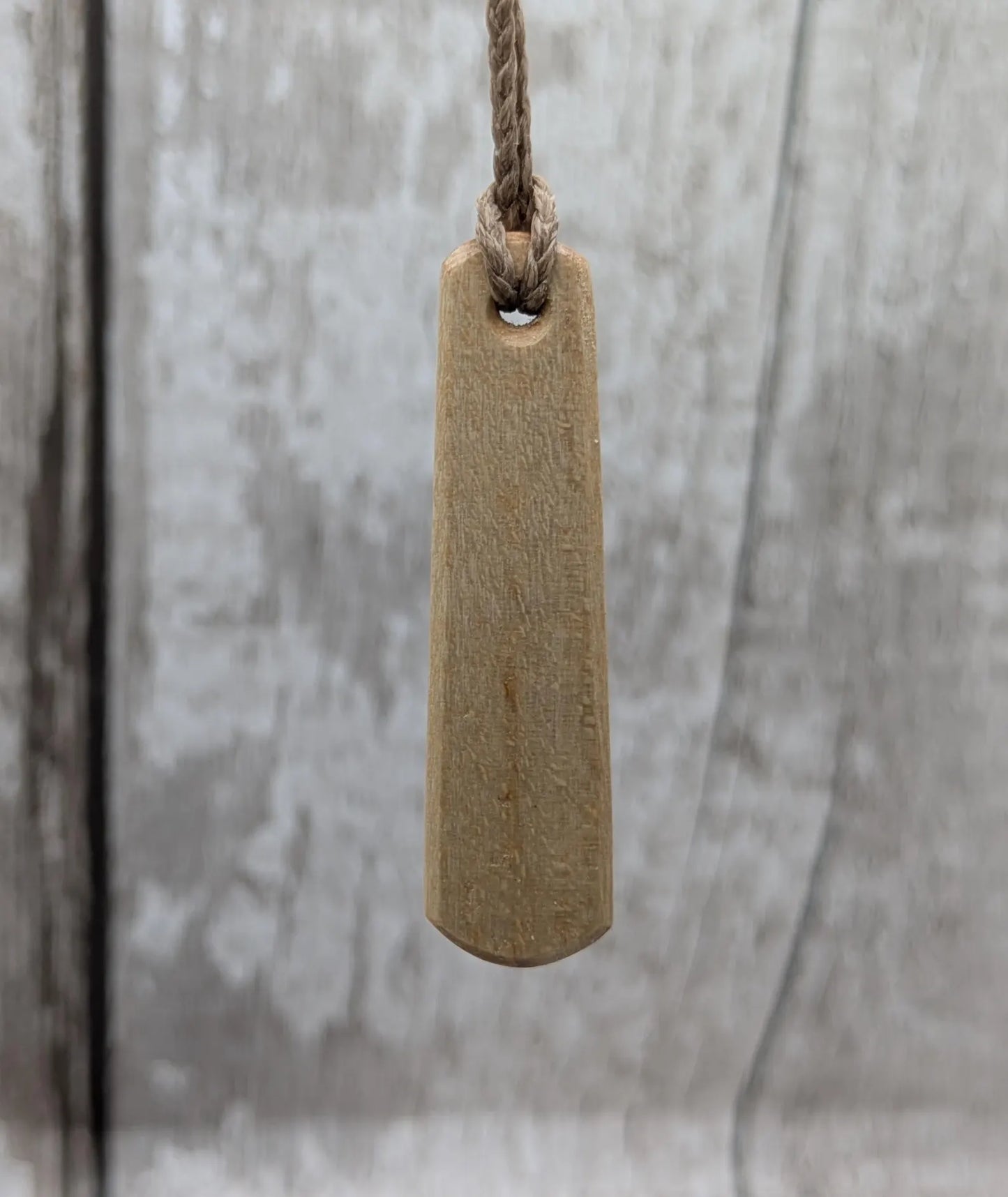 Lime wood Irish Gaeilic Tá mé Làidir, i am strong roimata pendant.