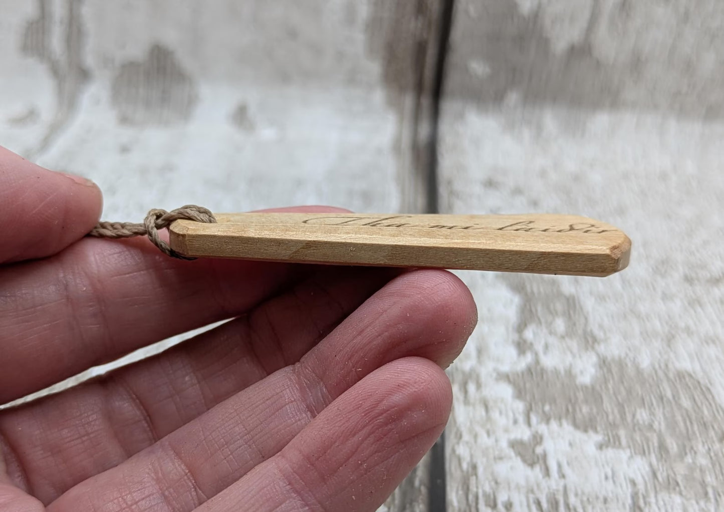 Lime wood Scots Gaelic roimata pendant. Tha mi làidir, I am strong.