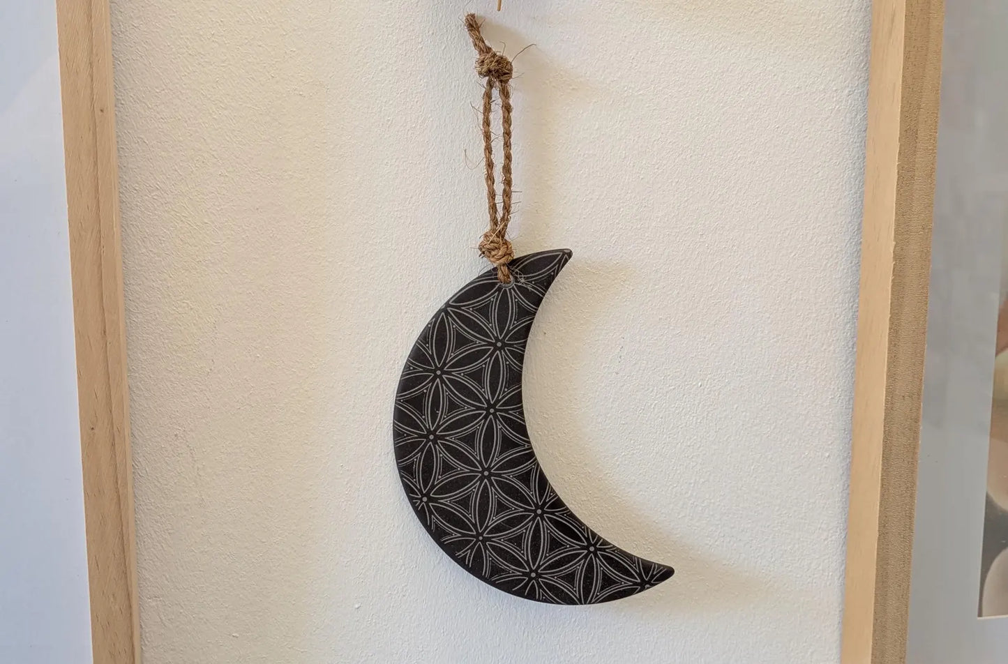 Welsh slate crescent moon with flower of life laser print hanging decoration.