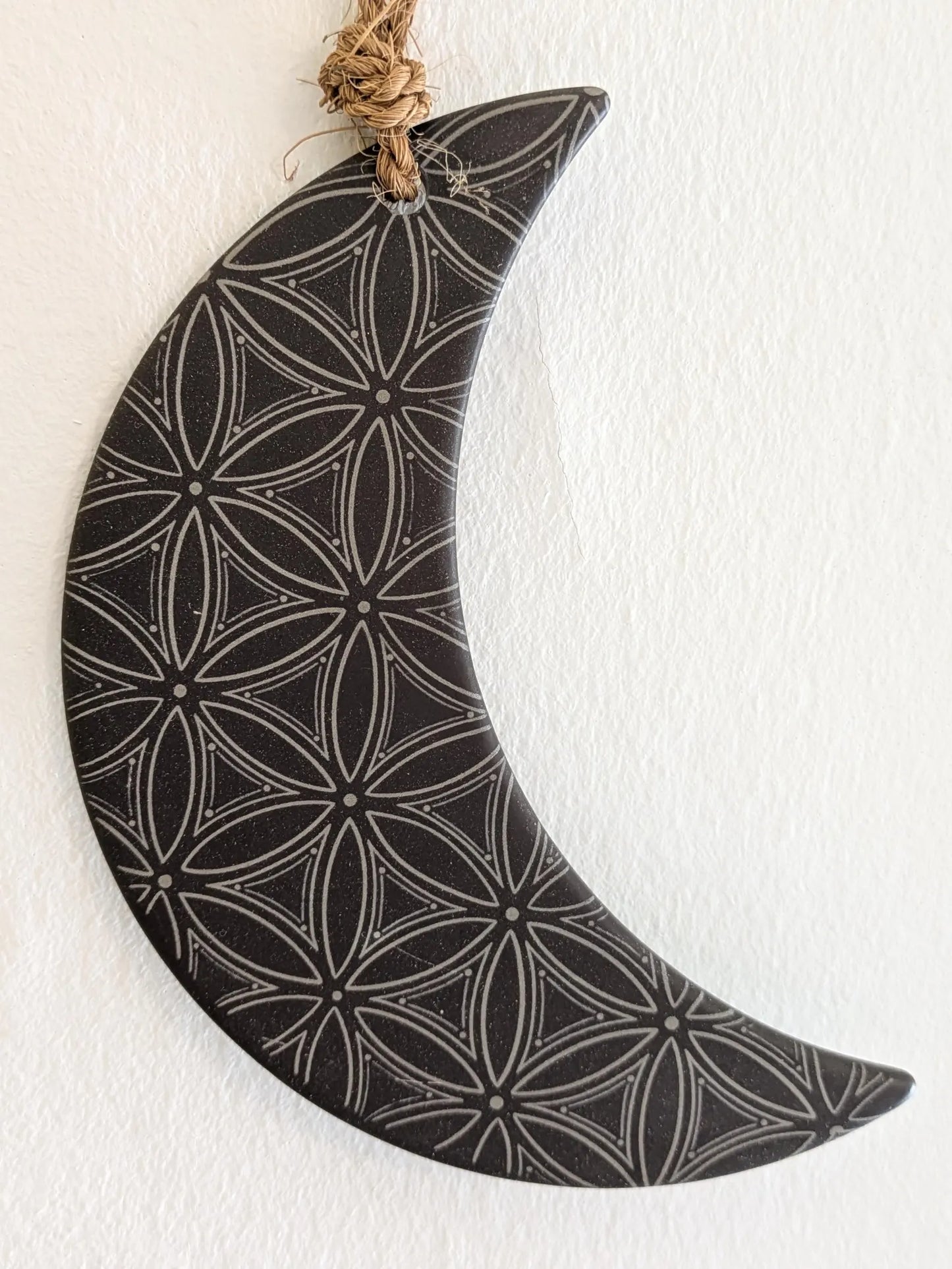 Welsh slate crescent moon with flower of life laser print hanging decoration.