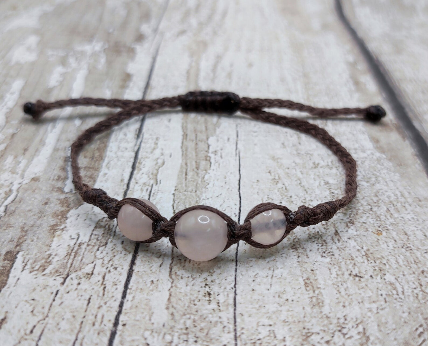 Rose quartz beaded macramé bracelet.